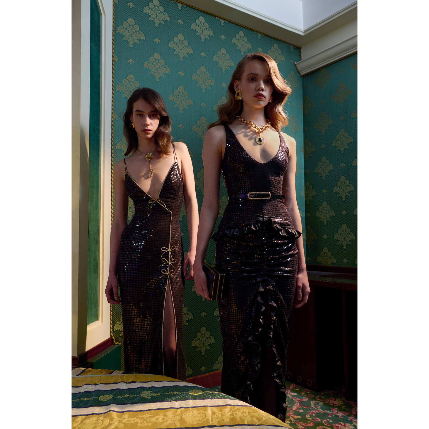 Black sequin-embroidered stretch silk georgette sleeveless dress cut to a fitted silhouette with a v-neckline. Finished with gold-tone bow details and side split.

Look 25 – Fall Winter 2026 Lookbook