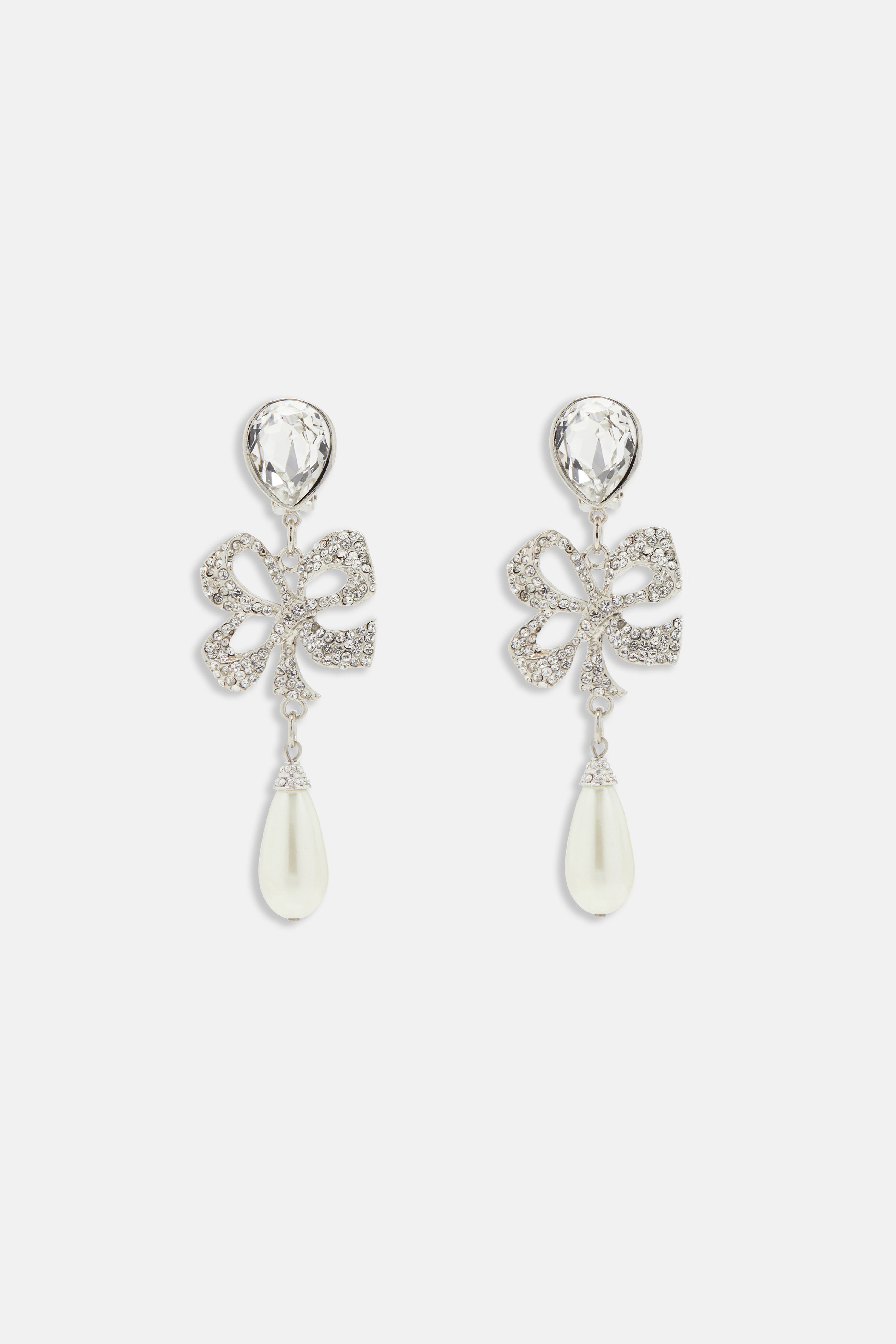 CRYSTAL BOW EARRINGS WITH PENDANT PEARL