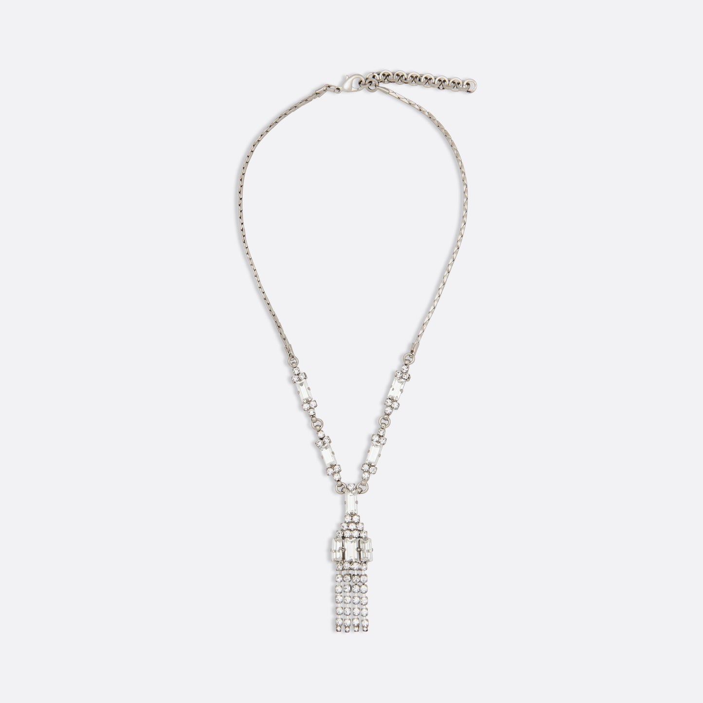 Crystal necklace with baguette-cut crystals embellishments, featuring crystal fringes, in silver-tone brass.
