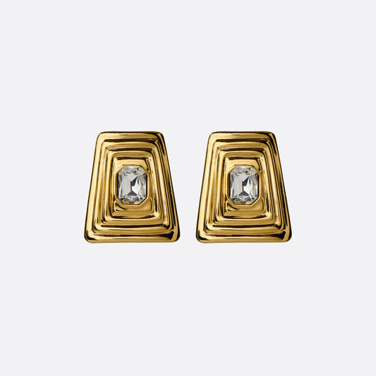 Gold-tone metal clip-on earrings with a central crystal detail.