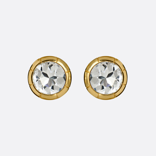 Gold-tone metal clip-on earrings with a round crystal.

Featured in the Fall Winter 2026 Lookbook.