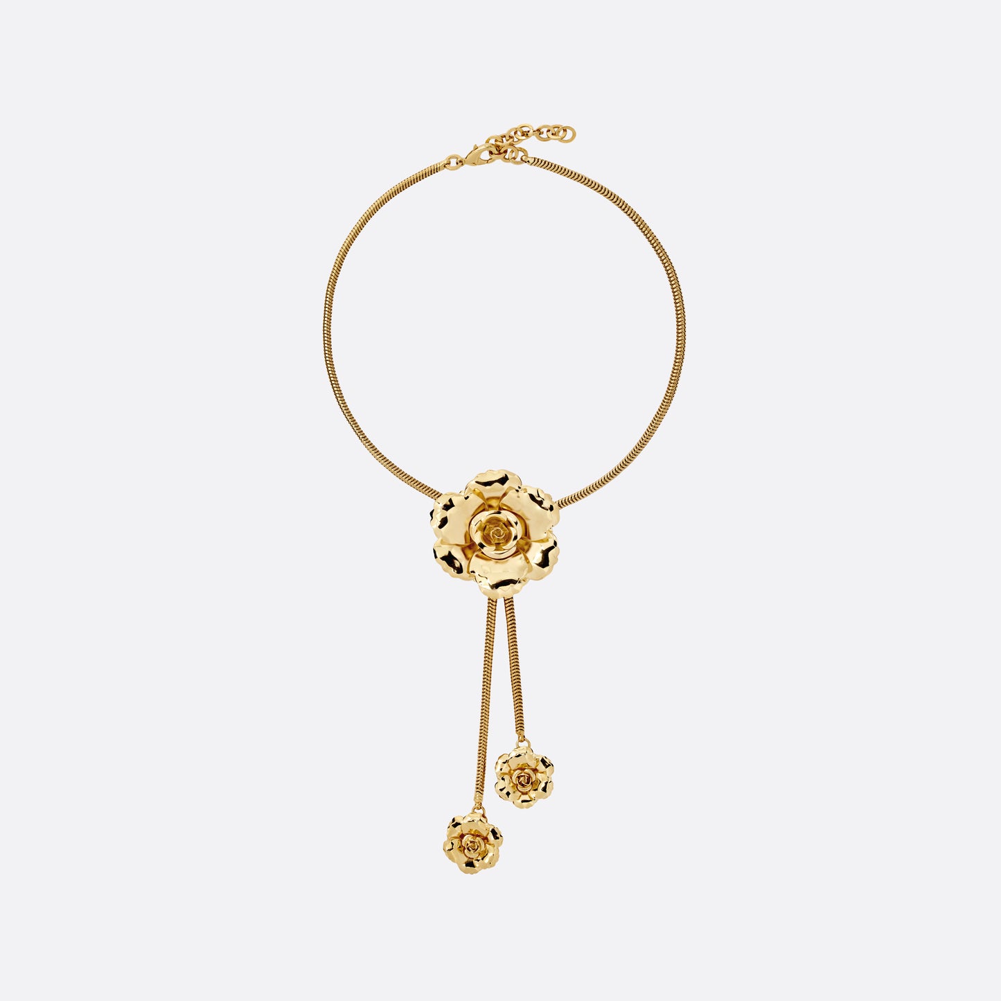 Gold-tone metal necklace centred by a floral motif. Finished with suspended flower charms and an adjustable chain fastening.

Featured in the Fall Winter 2026 Lookbook.