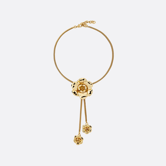 Gold-tone metal necklace centred by a floral motif. Finished with suspended flower charms and an adjustable chain fastening.

Featured in the Fall Winter 2026 Lookbook.