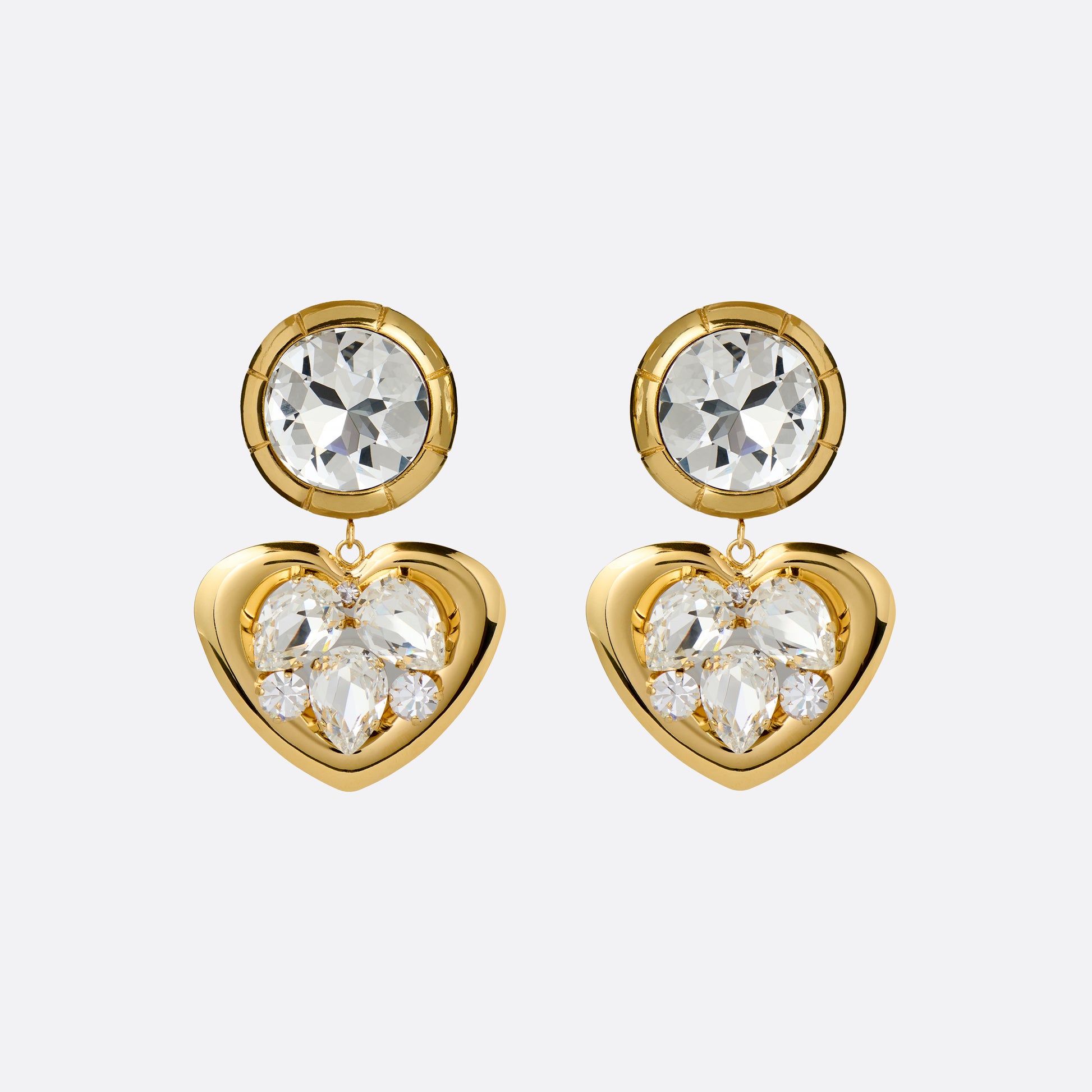 Gold-tone metal clip-on earrings with crystal details and a heart-shaped pendant.

Featured in the Fall Winter 2026 Lookbook.