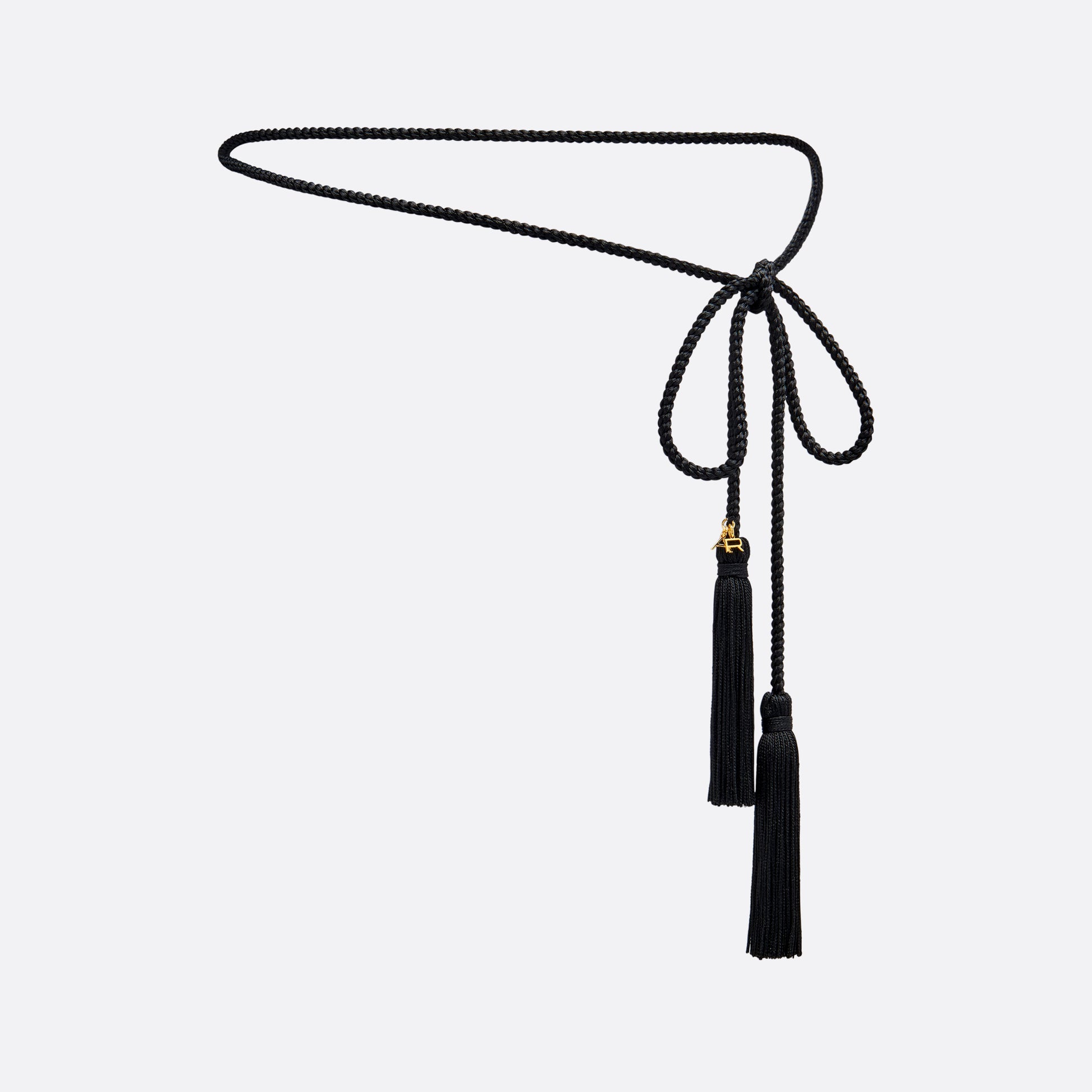Black braided torchon belt with tassels and gold-tone "AR" logo charm.