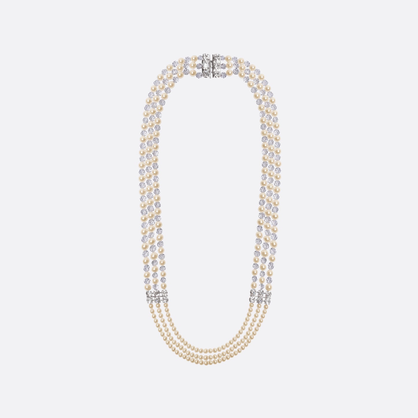 Multi-strand pearl necklace detailed with crystal embellishments and clear bead accents. Finished with a clasp fastening.

Featured in the Fall Winter 2026 Lookbook.