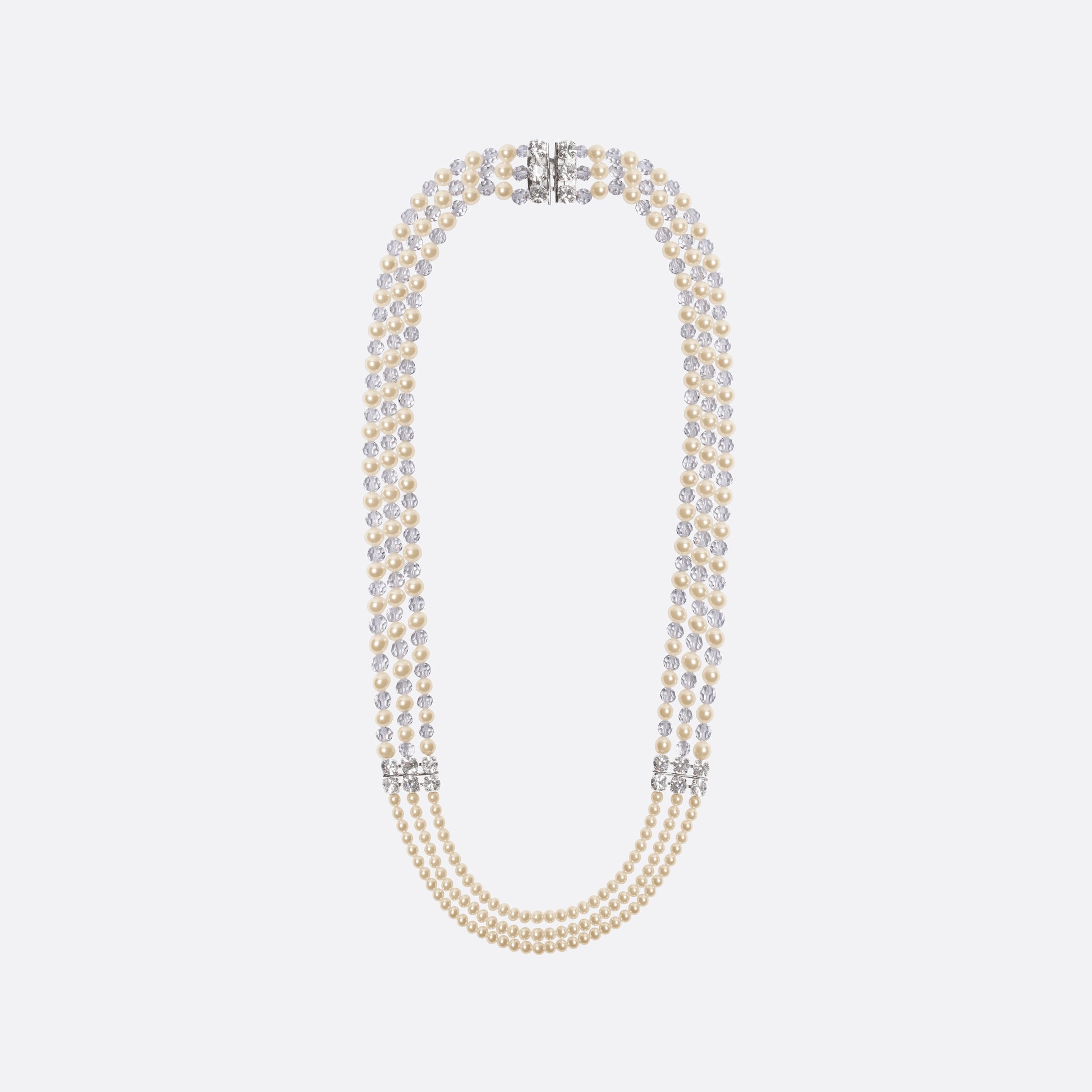 Multi-strand pearl necklace detailed with crystal embellishments and clear bead accents. Finished with a clasp fastening.

Featured in the Fall Winter 2026 Lookbook.