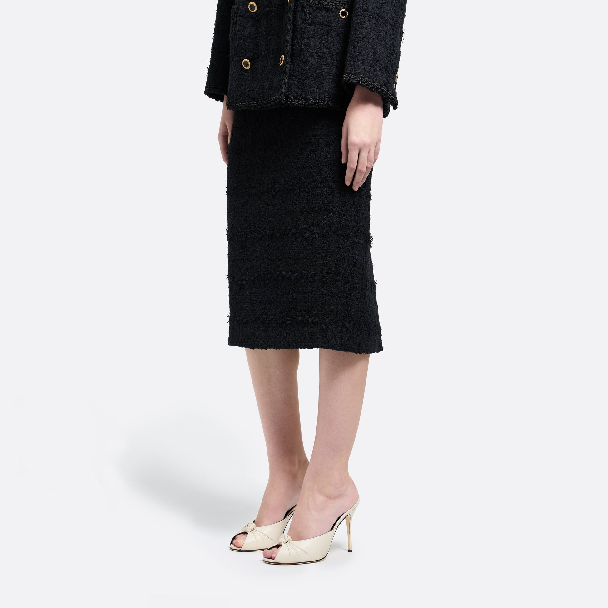 Black check tweed bouclé pencil skirt with a back split.