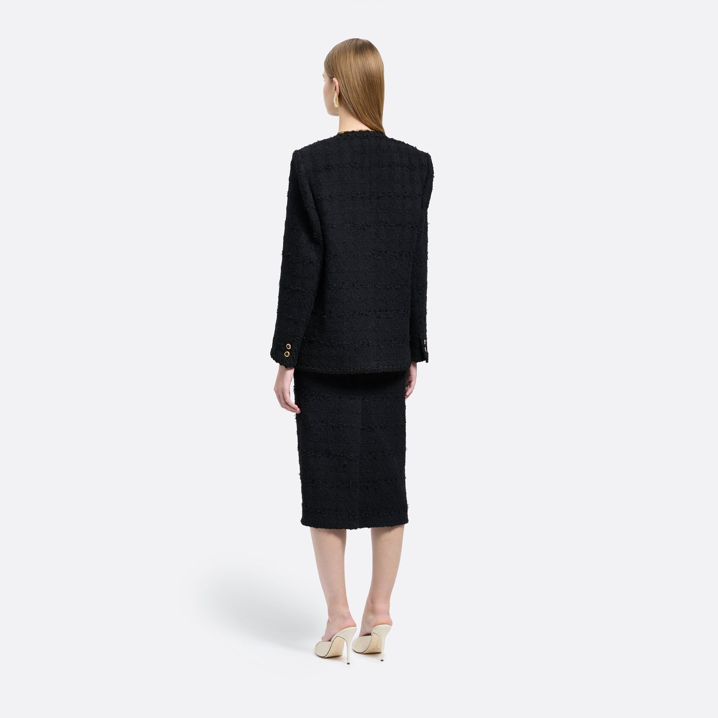 Black check tweed bouclé pencil skirt with a back split.