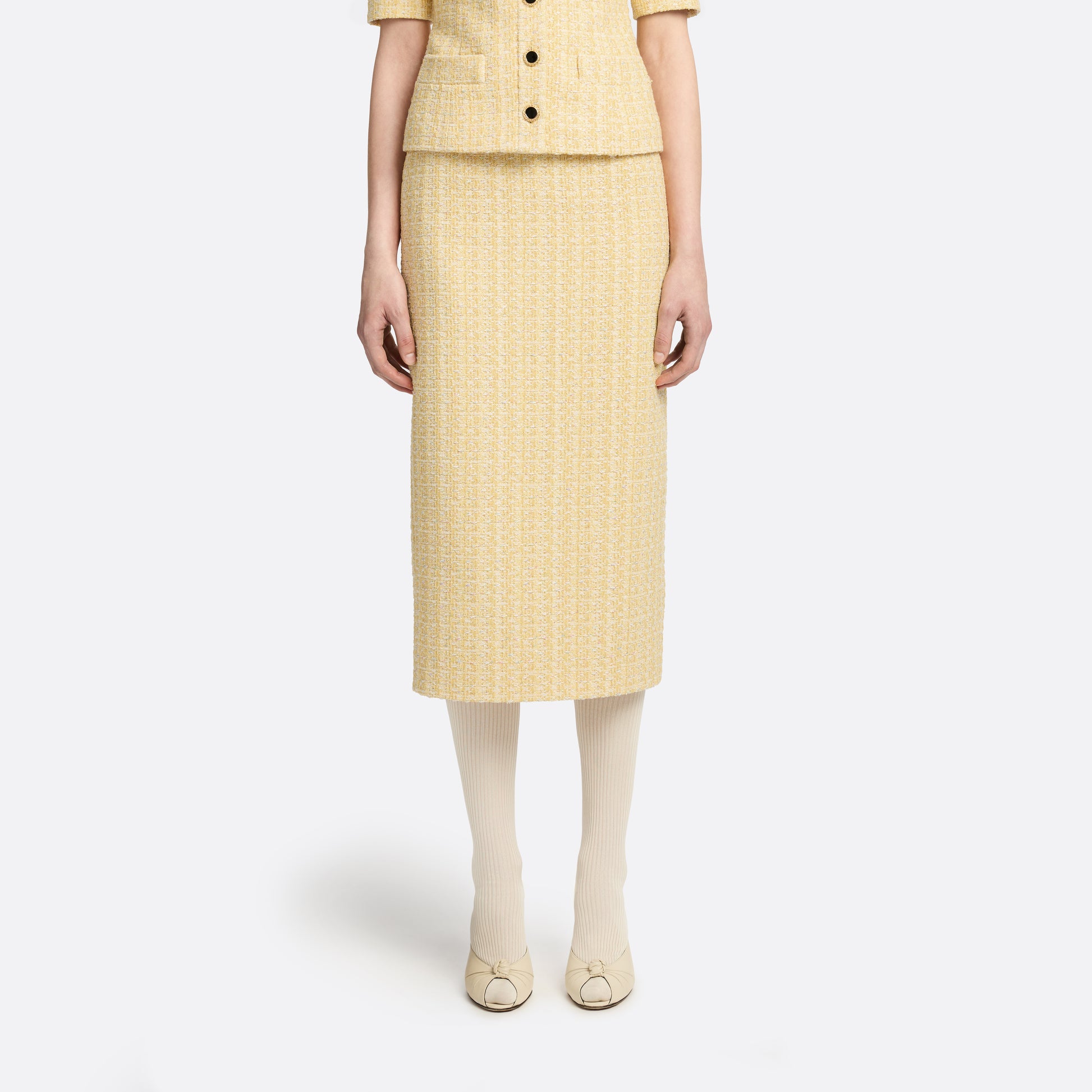 Pale yellow sequin tweed pencil skirt with a back split.