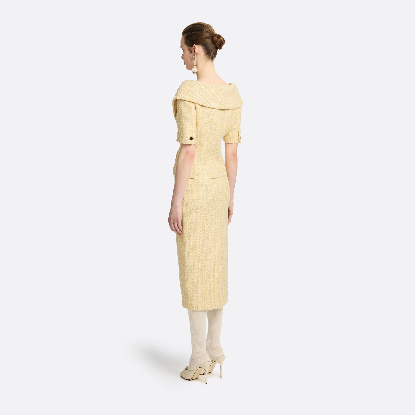 Pale yellow sequin tweed pencil skirt with a back split.