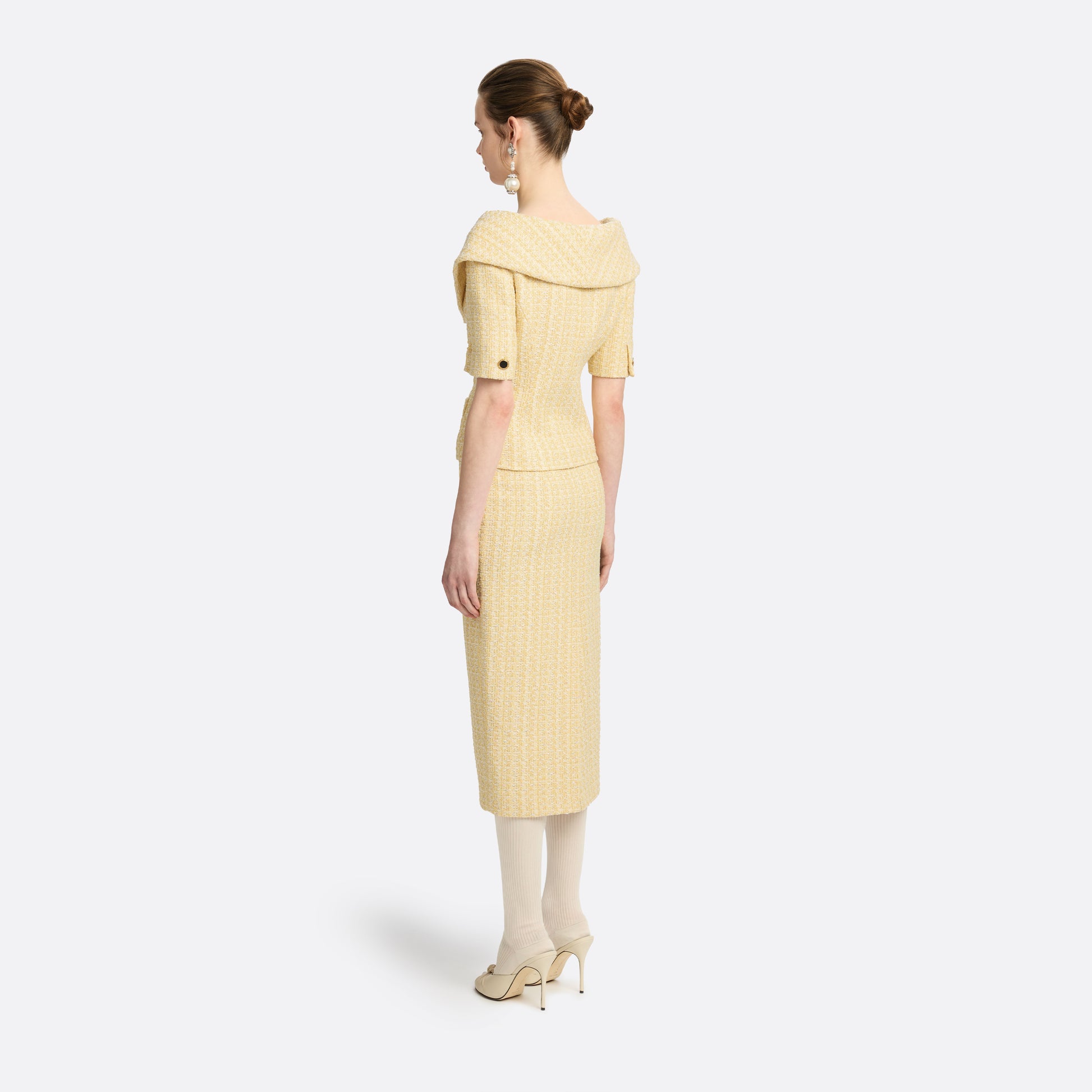 Pale yellow sequin tweed pencil skirt with a back split.