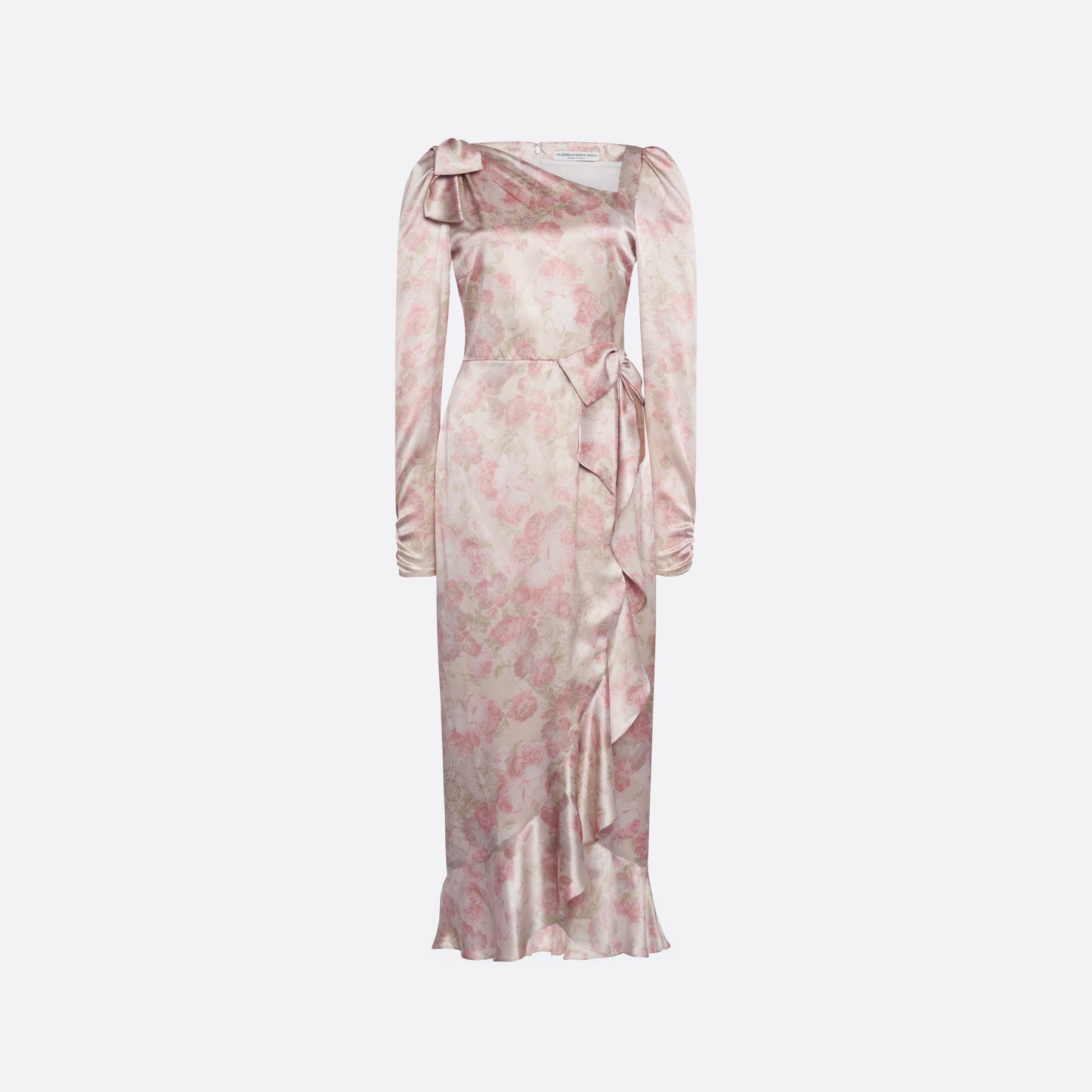 Pale pink floral print silk satin midi dress with long sleeves and draped slit, featuring volant detail and bows.