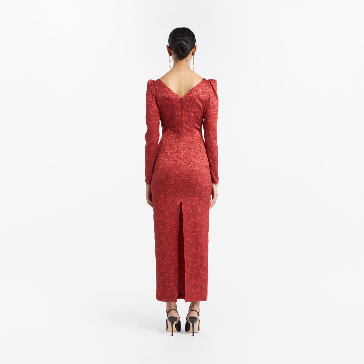 Red silk jacquard evening dress with a lace insert on the neckline and long sleeves, featuring ribbon trims.