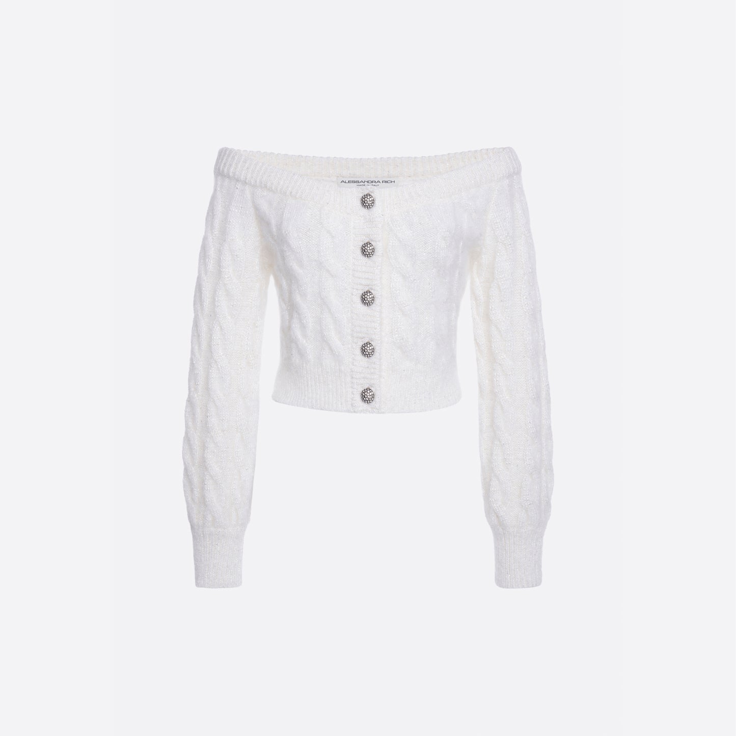 White mohair blend sequin cable knit off-shoulder cardigan with long sleeves and jewel buttons.