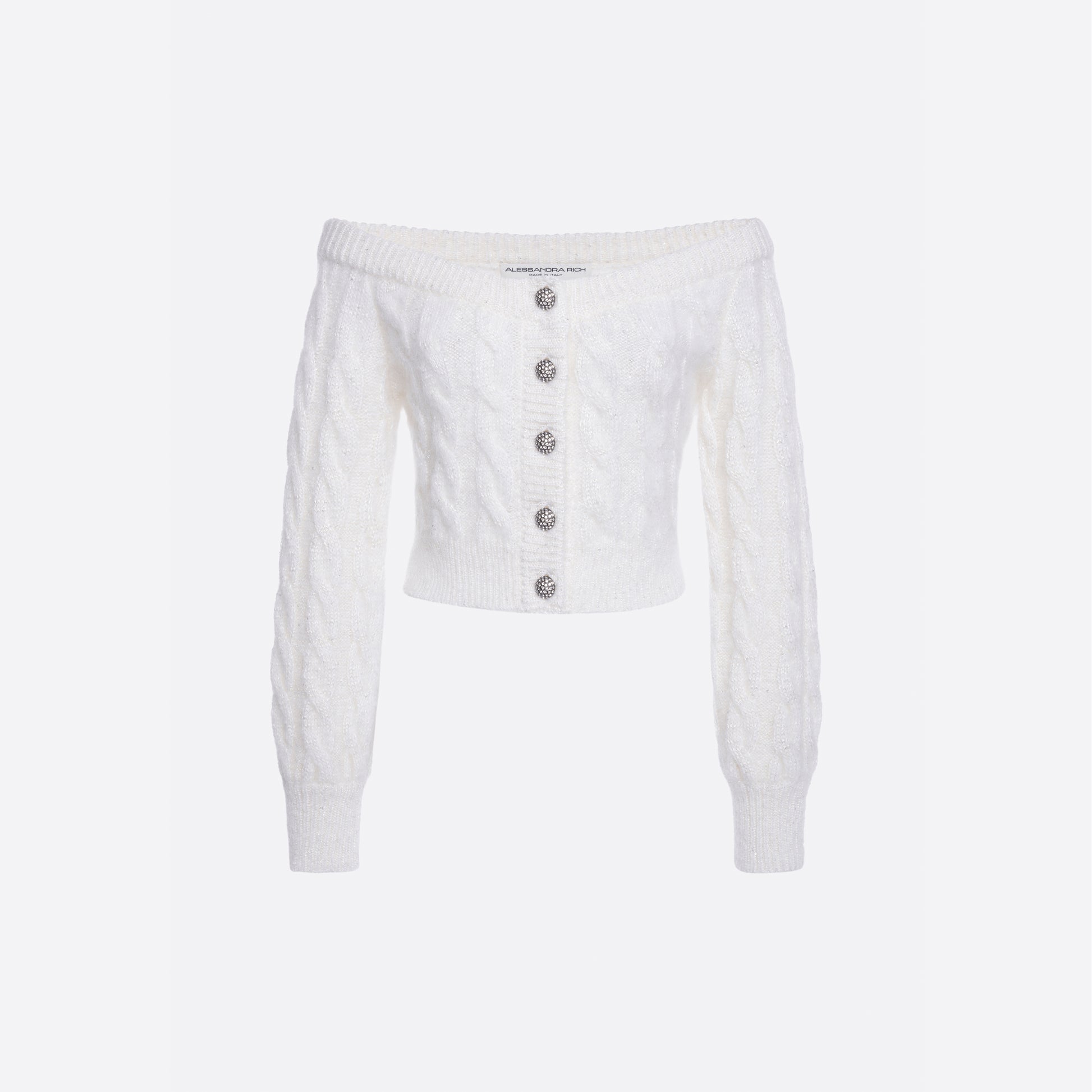 White mohair blend sequin cable knit off-shoulder cardigan with long sleeves and jewel buttons.