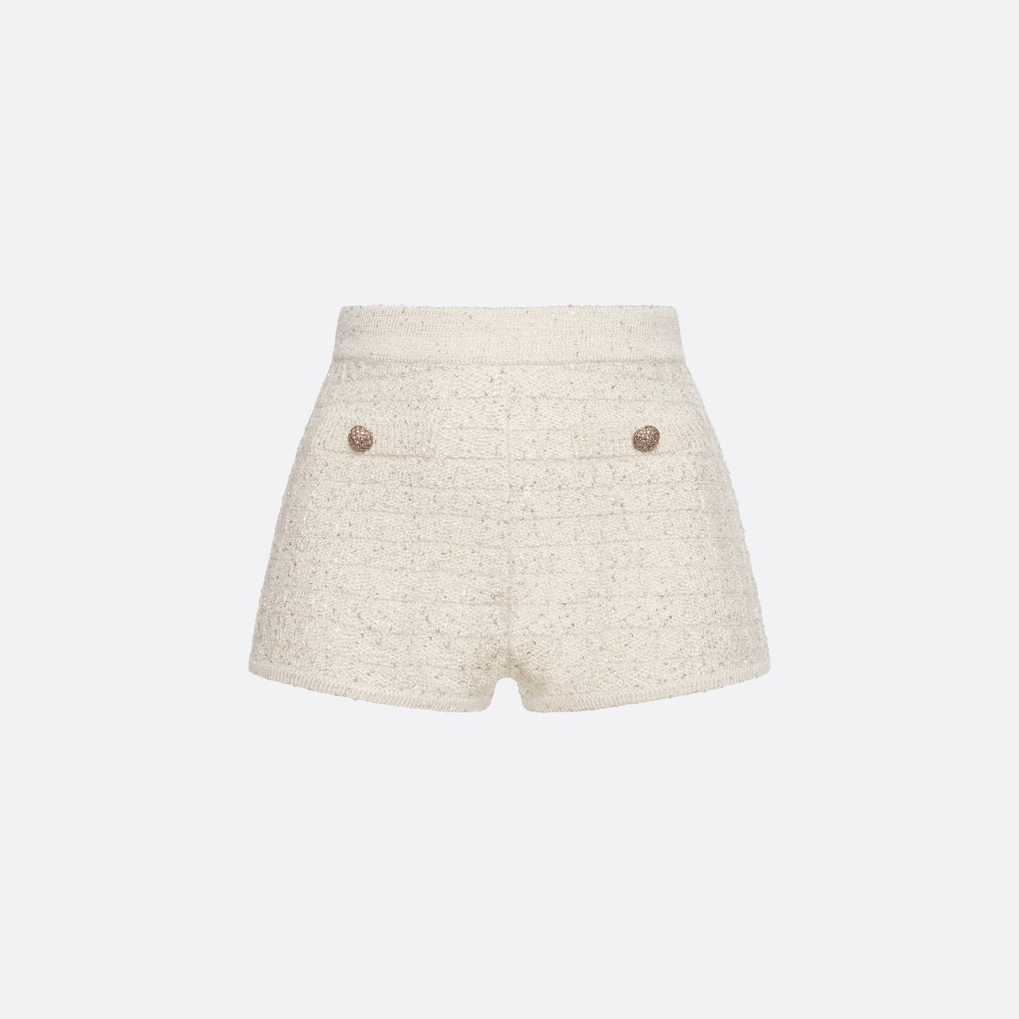 White high-waisted wool sequin knit shorts with jewel buttons.