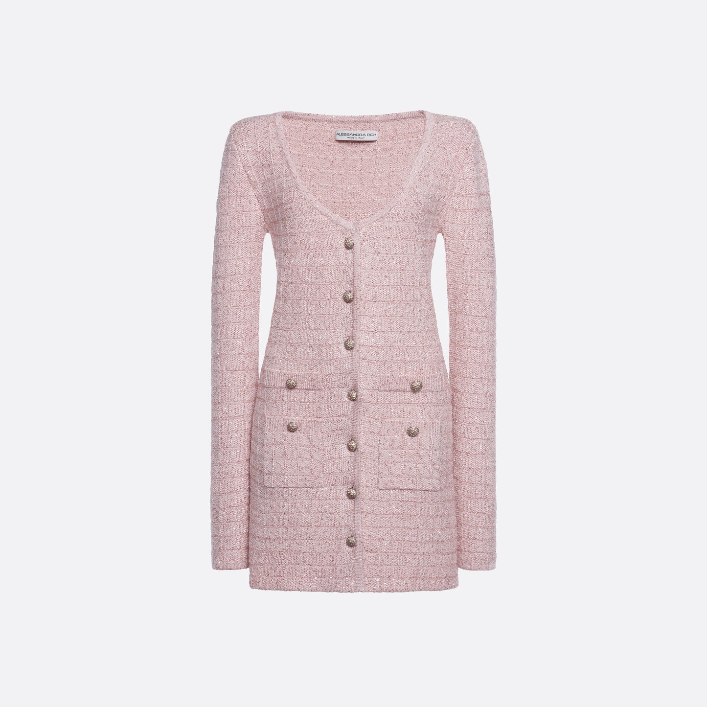 Pink sequin knit mini dress with a scooped neckline and long sleeves, featuring jewel buttons and patch pockets.