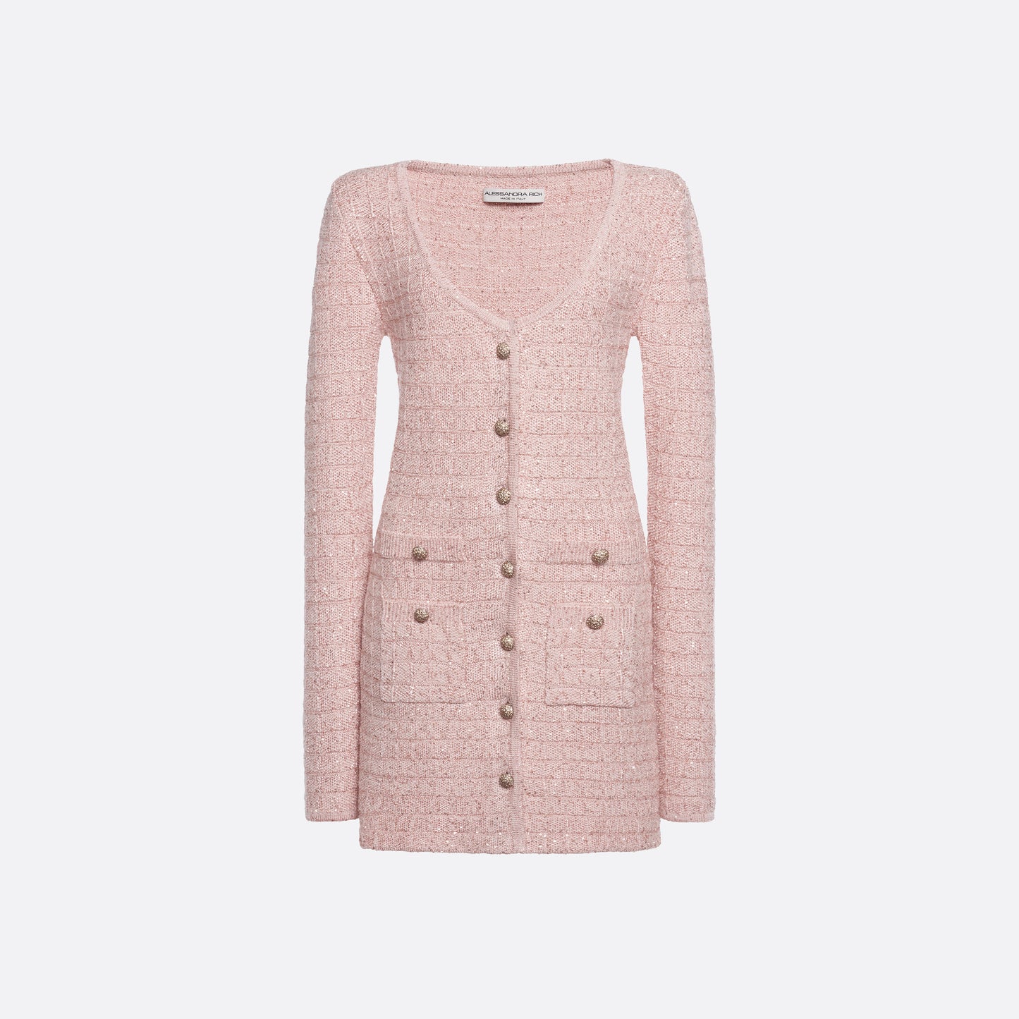 Pink sequin knit mini dress with a scooped neckline and long sleeves, featuring patch pockets jewel buttons.