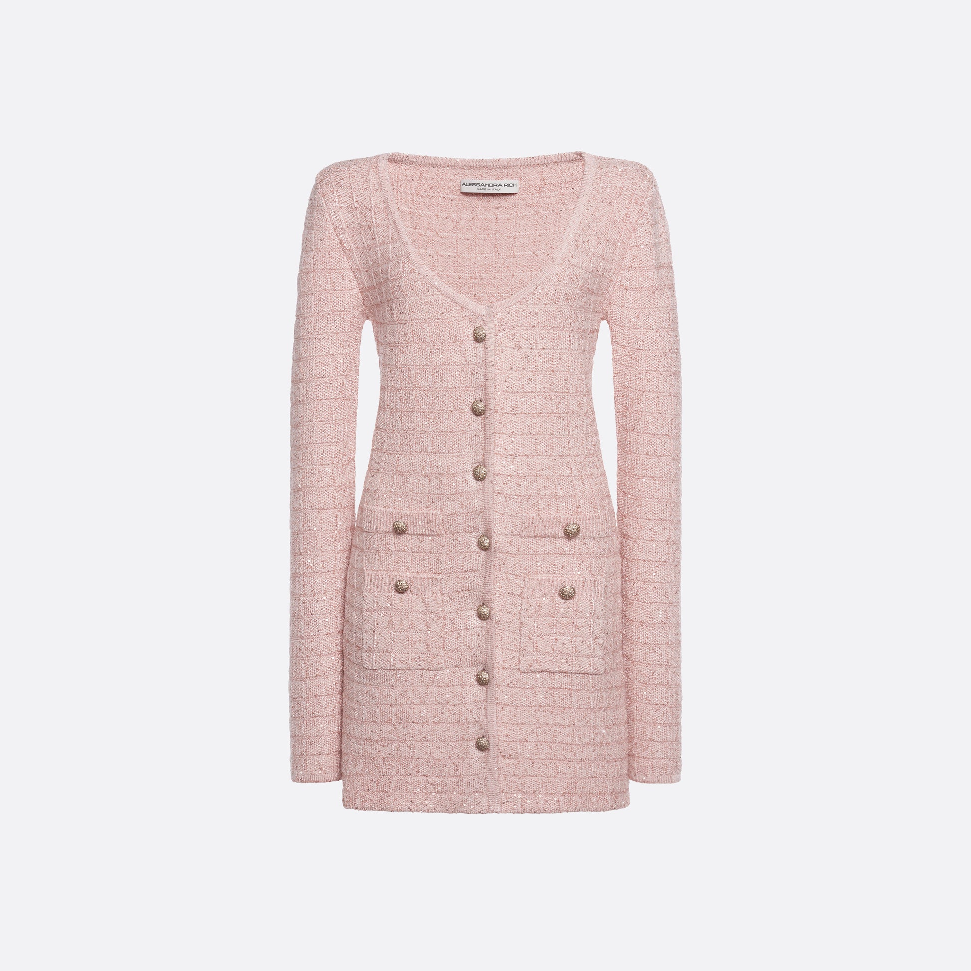 Pink sequin knit mini dress with a scooped neckline and long sleeves, featuring patch pockets jewel buttons.