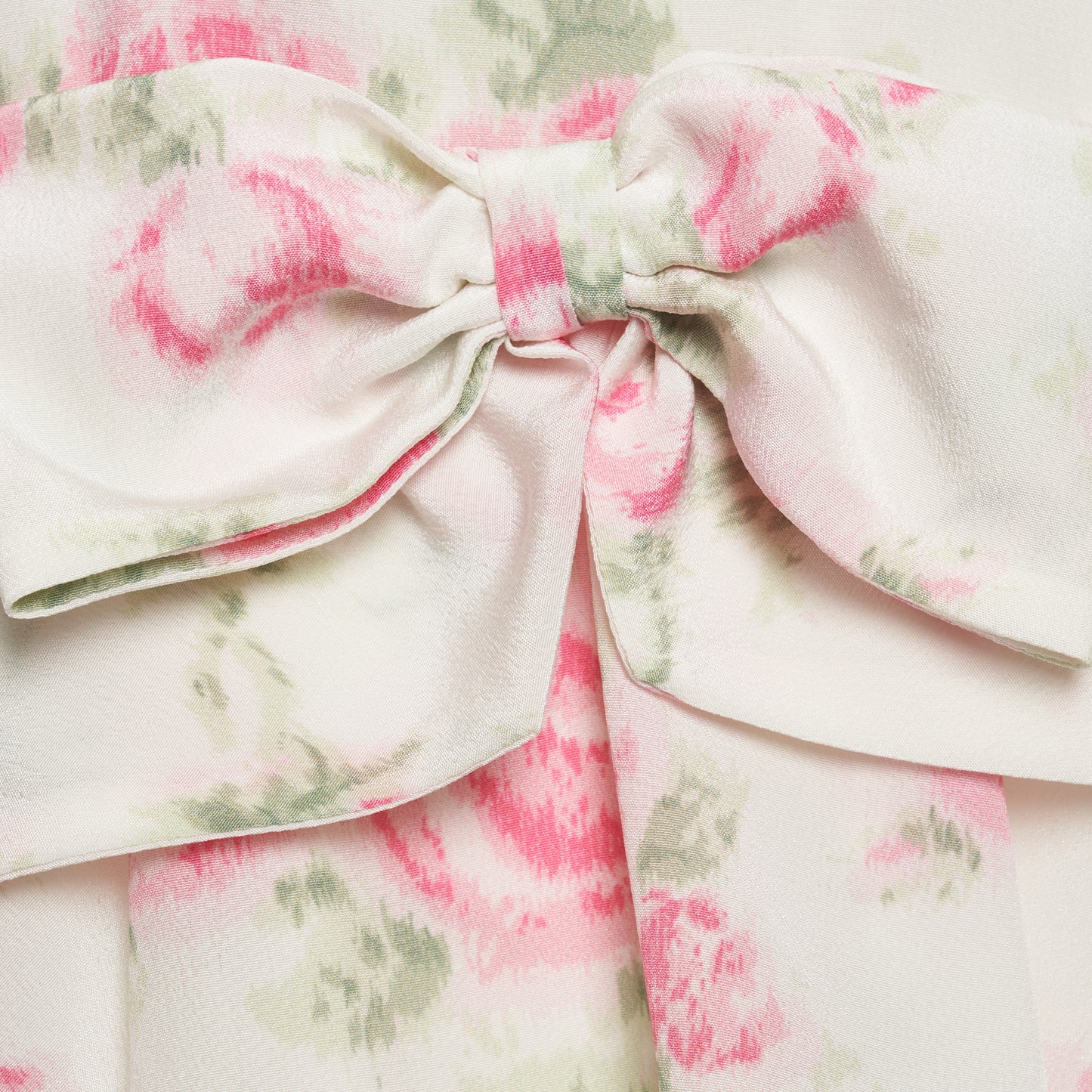 Pink and white floral-print silk crêpe de chine midi dress with self-tie shoulder straps and a ruffled neckline. A peplum defines the silhouette, while the straight skirt is finished with delicate ruffle trim.
