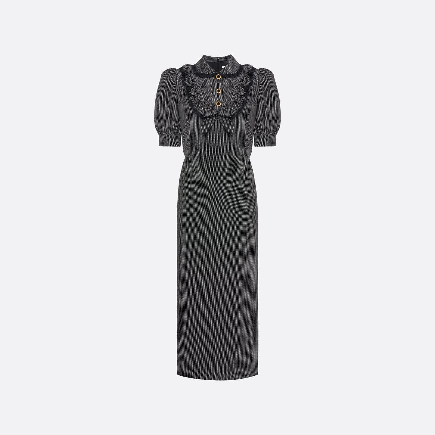 Black and white small polka-dot print silk crêpe de chine midi dress with short puffed sleeeves and black and old tone buttons. Finished with a lace trimmed collar and ruffled bib detailing.

Look 31 – Fall Winter 2026 Lookbook.
