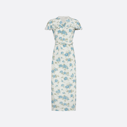 Light blue and white floral-print silk crêpe de chine midi dress with a high neckline and bow detail. With a fitted silhouette, it is finished with ruffle-trimmed short sleeves and a slim belt.

Look 14 – Fall Winter 2026 Lookbook.