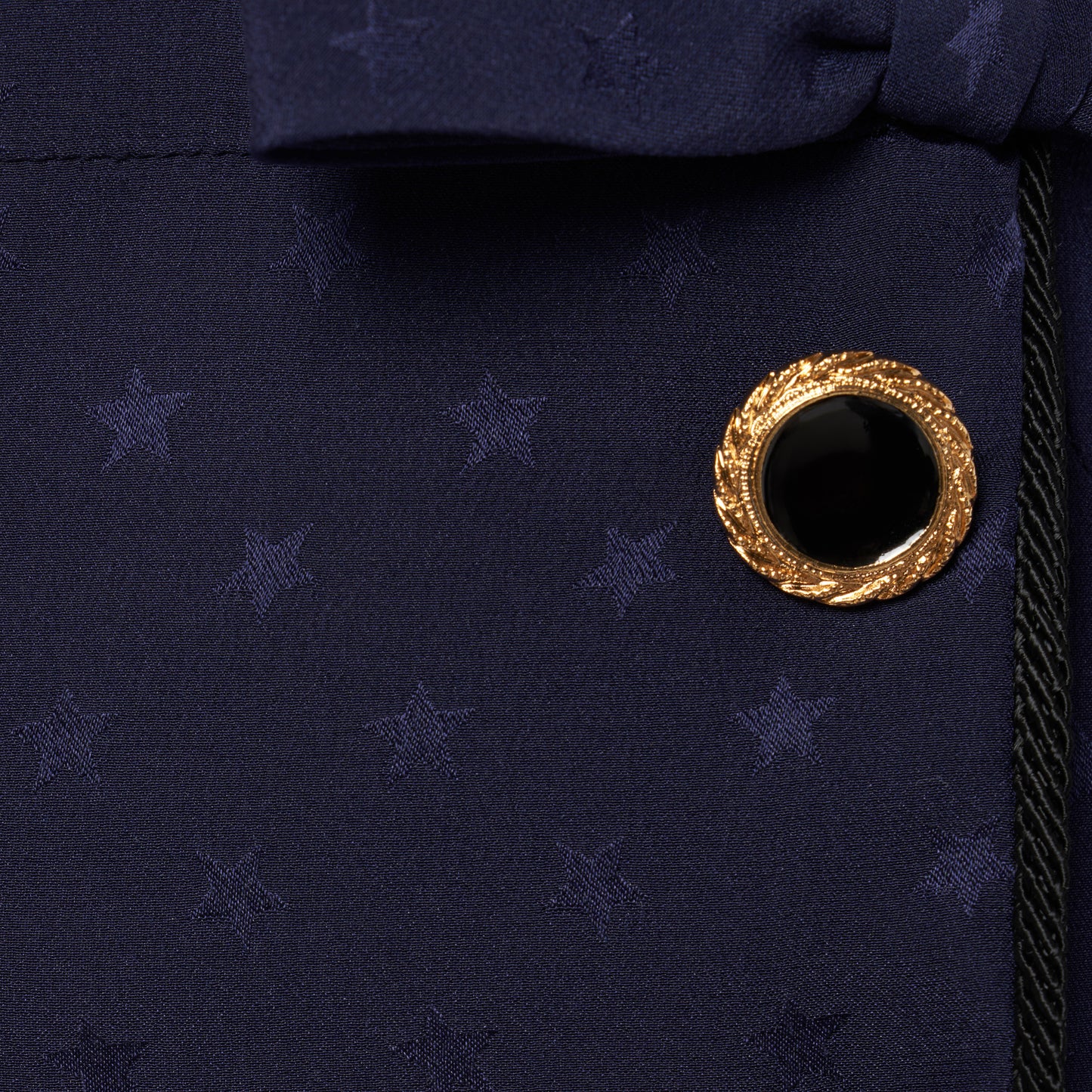 Navy blue star-jacquard silk midi dress with a wrap-effect V-neckline detailed with a ruffled trim and long sleeves. Finished with black and gold-tone buttons, bows at the waist and a pleated skirt with a front split.