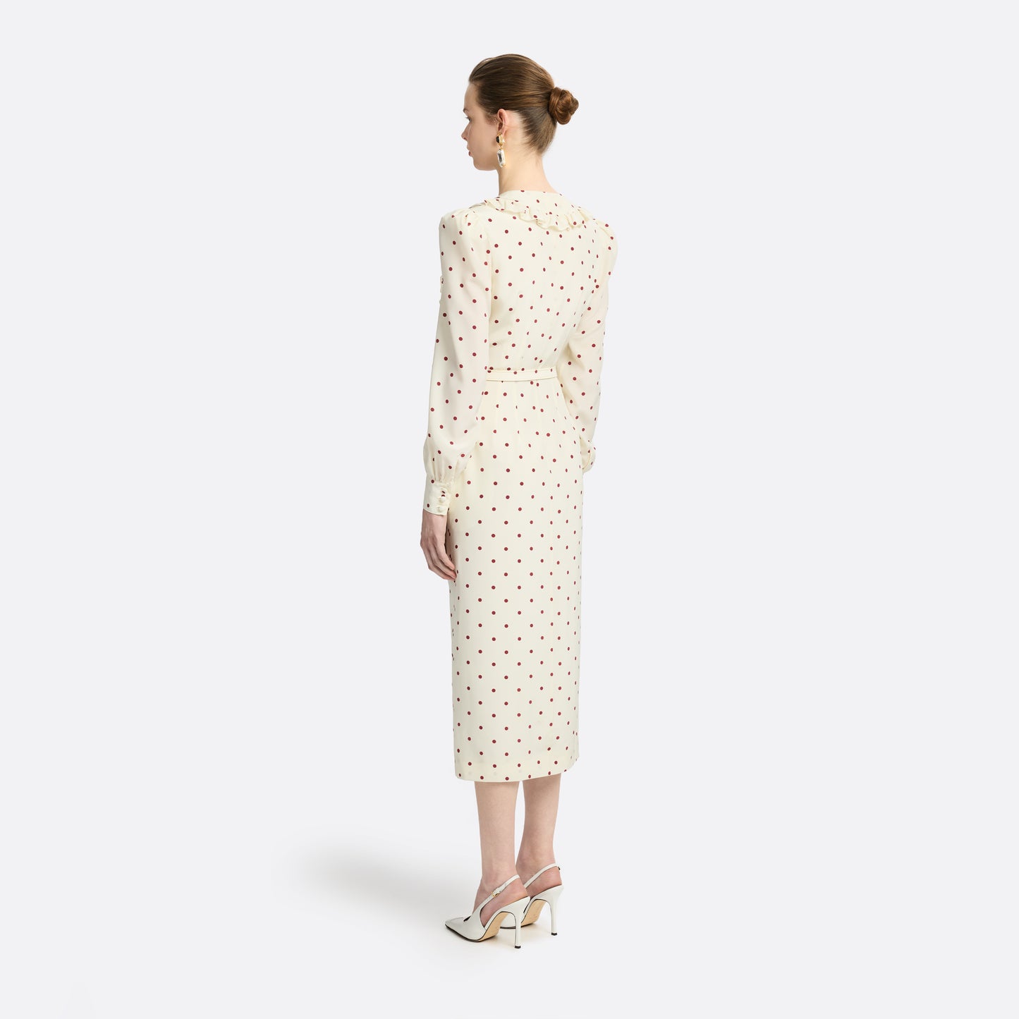 Cream and bordeaux polka-dot silk crêpe de chine midi dress with a deep V-neckline framed by a ruffle-trimmed collar, a front button closure, long sleeves and a slim belt.