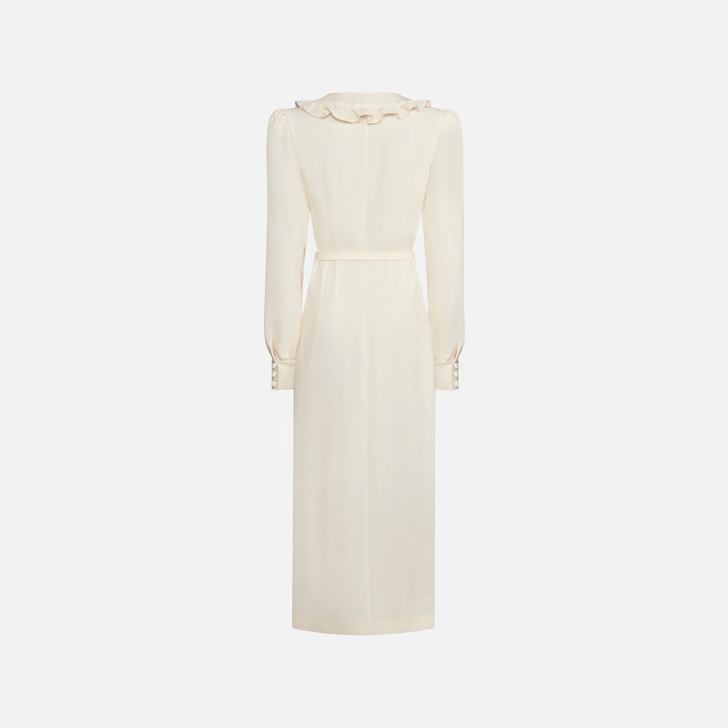 Cream light wool crêpe midi dress with a deep V-neckline framed by a ruffle-trimmed collar and long sleeves. Finished with a front button closure accented by black and gold-tone buttons and a slim belt.

Look 10 – Fall Winter 2026 Lookbook.