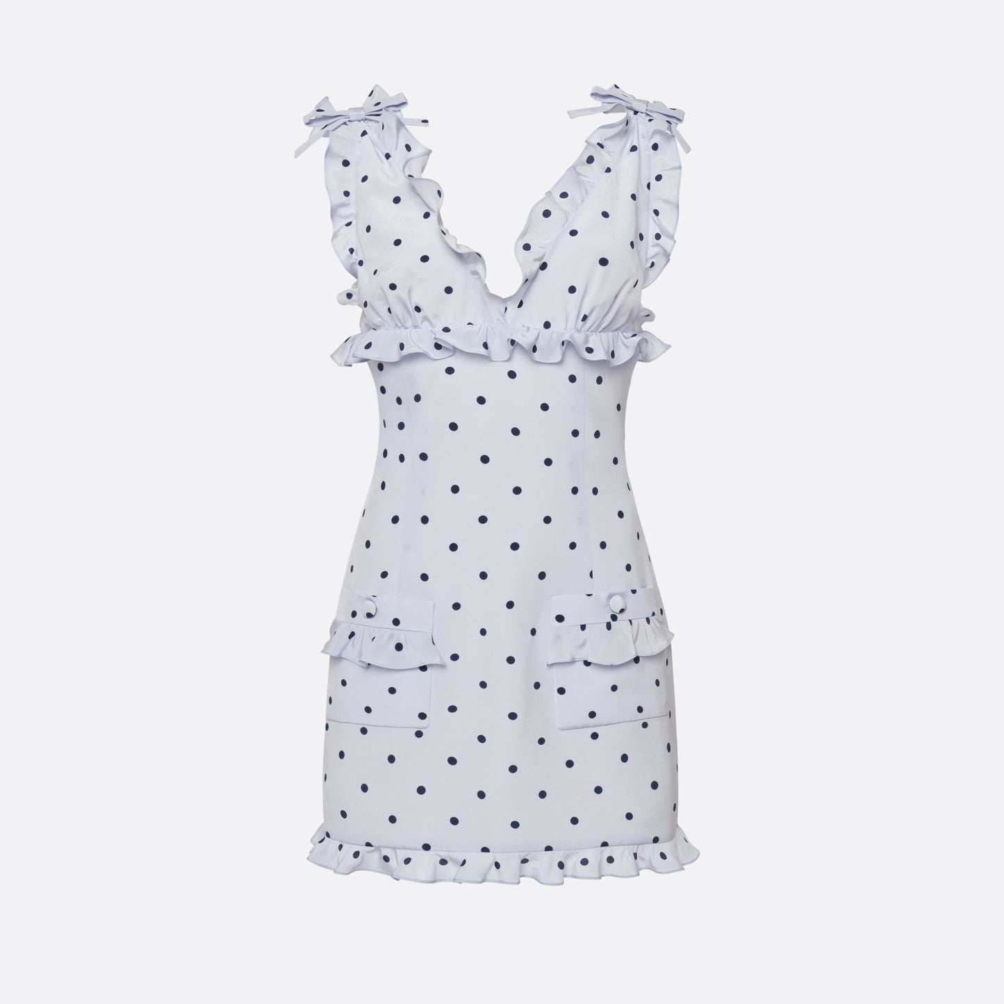 Light blue polka-dot silk crêpe de chine mini dress with bow-detailed shoulder straps and a ruffled neckline. The fitted silhouette is finished with patch pockets and a ruffled hem.