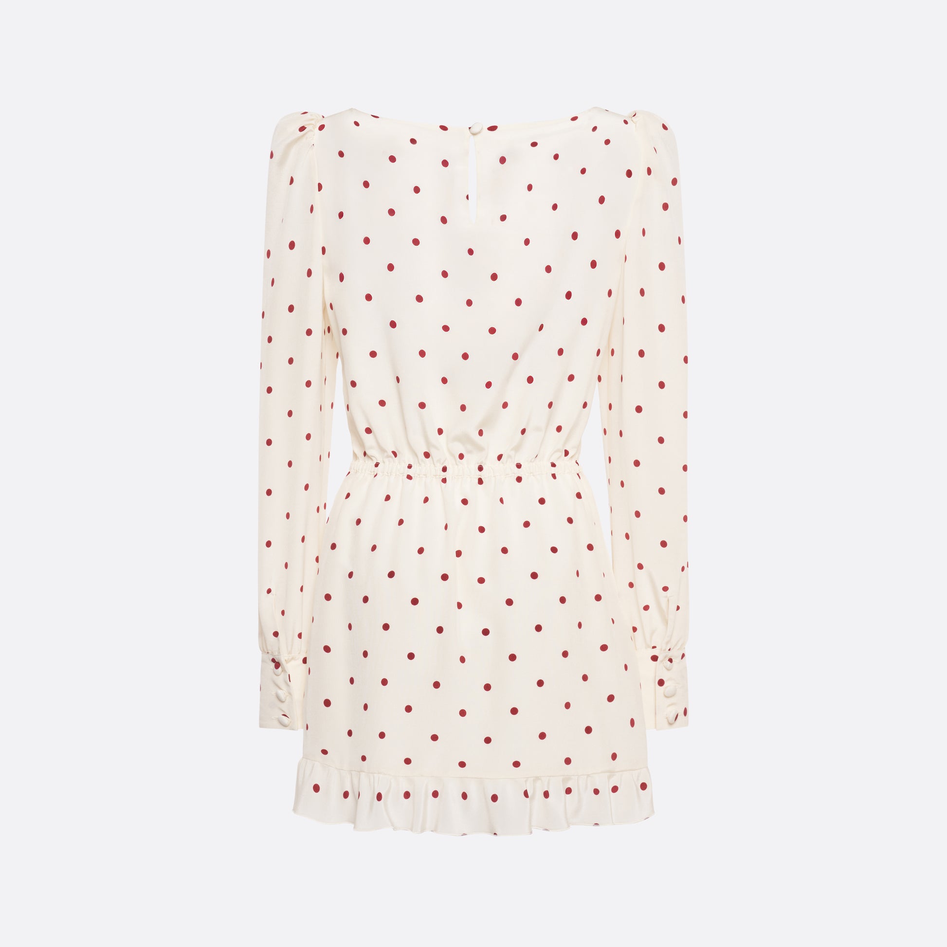 Cream and bordeaux polka-dot silk crêpe de chine mini dress with a scooped neckline and long sleeves. Defined by a drawstring waist, the silhouette is finished with patch pockets and a volant hem.