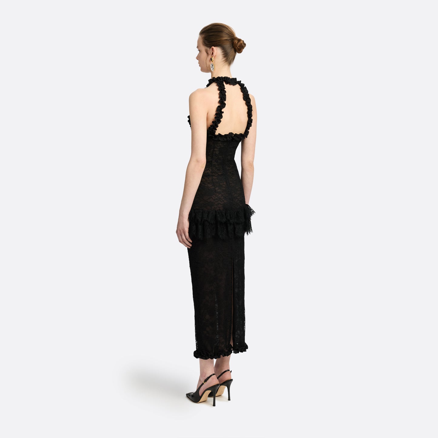 Black Chantilly lace halterneck evening dress with ruffled trims and bows.

Look 26 – Fall Winter 2026 Lookbook.