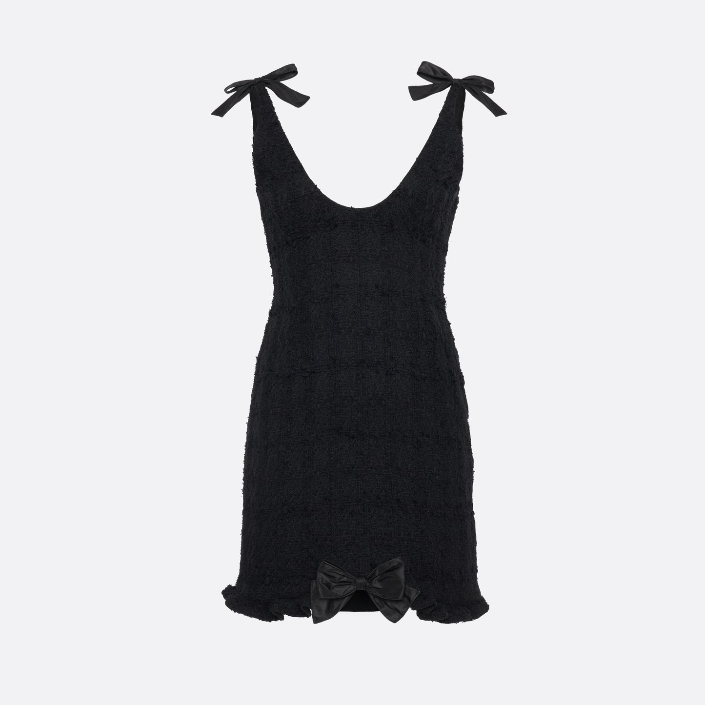 Black check tweed bouclé mini dress with a fitted silhouette and a soft ruffle at the hem. The shoulder straps are finished with bows.

Look 16 – Fall Winter 2026 Lookbook.