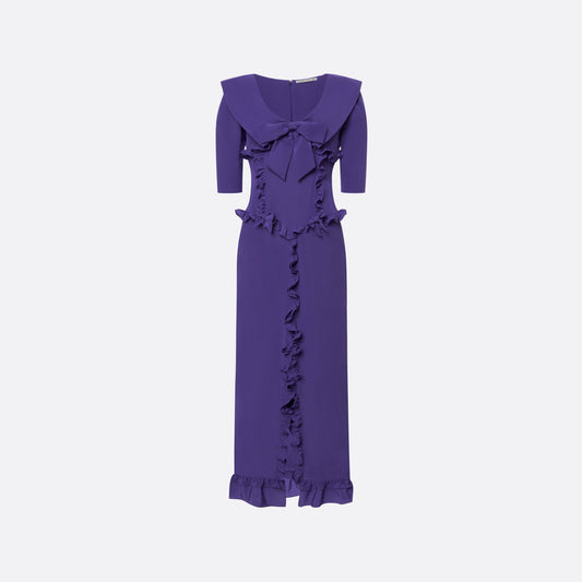 Purple silk crêpe de chine dress with a wide collar, ruffle details, bows and a centre split.

Look 7 – Fall Winter 2026 Lookbook.
