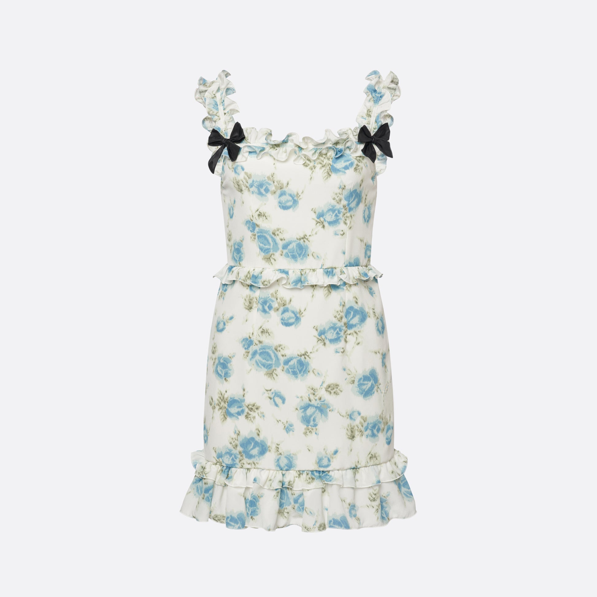 Light blue and white floral-print silk crêpe de chine mini dress with bow-detailed shoulder straps and a ruffled neckline. The silhouette is defined by ruffles at the waist and hem.