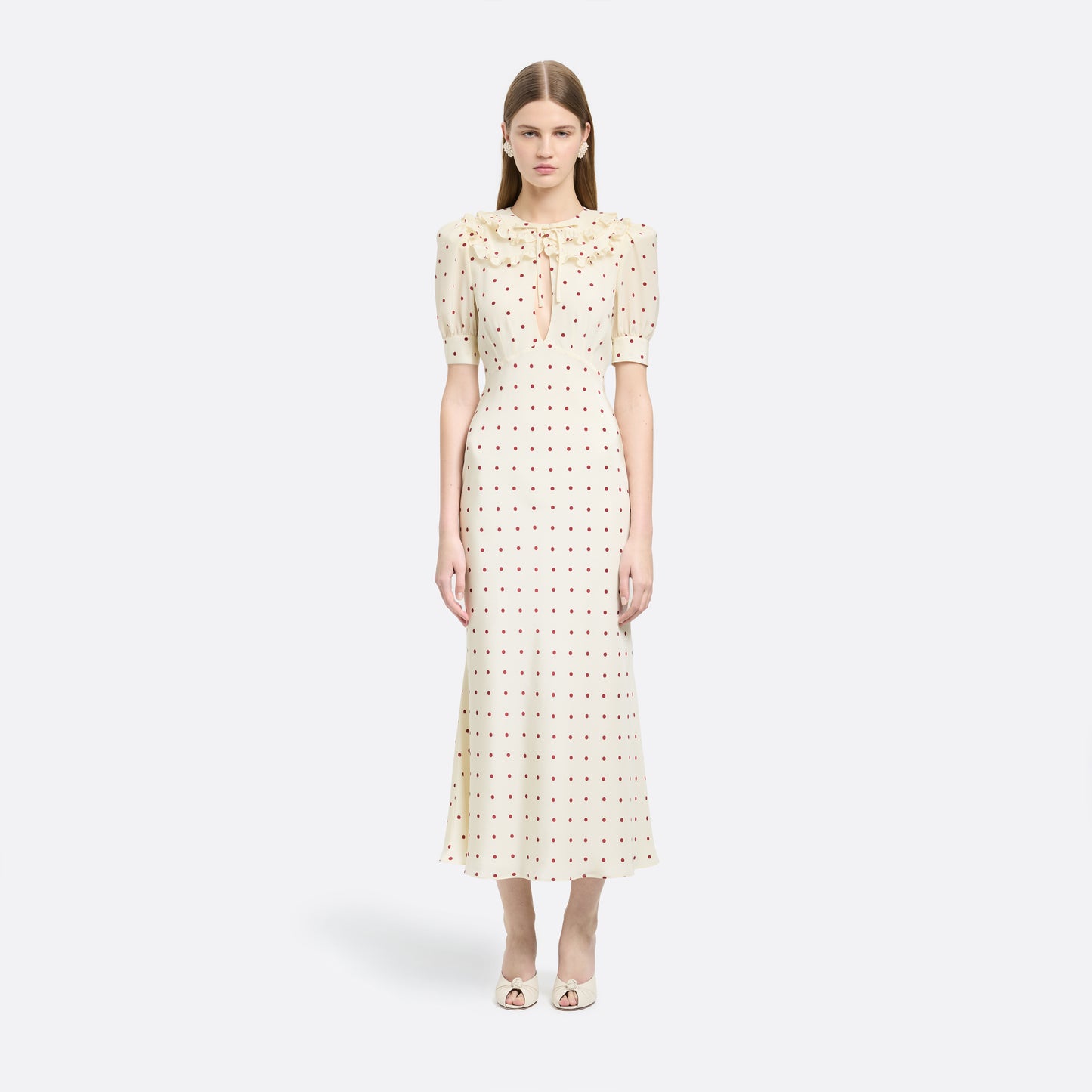 Cream and bordeaux polka-dot silk crêpe de chine midi dress with short puff sleeves and a ruffled collar finished with a tie detail.
