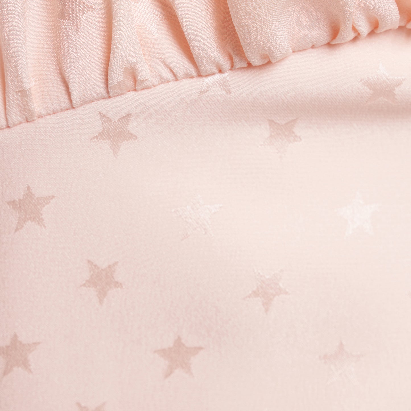 Light pink star-jacquard silk midi dress with short puff sleeves and a square neckline detailed with black bows and a ruffled trim.
