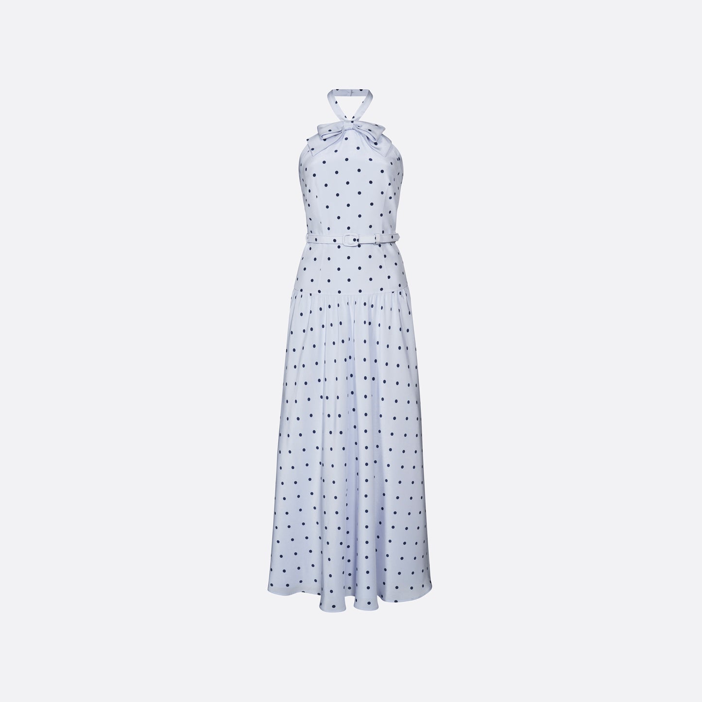 Light blue polka-dot silk crêpe de chine halterneck dress with a bow detail at the neckline. Defined by a fitted waist with a slim belt, the silhouette is finished with a flared skirt.