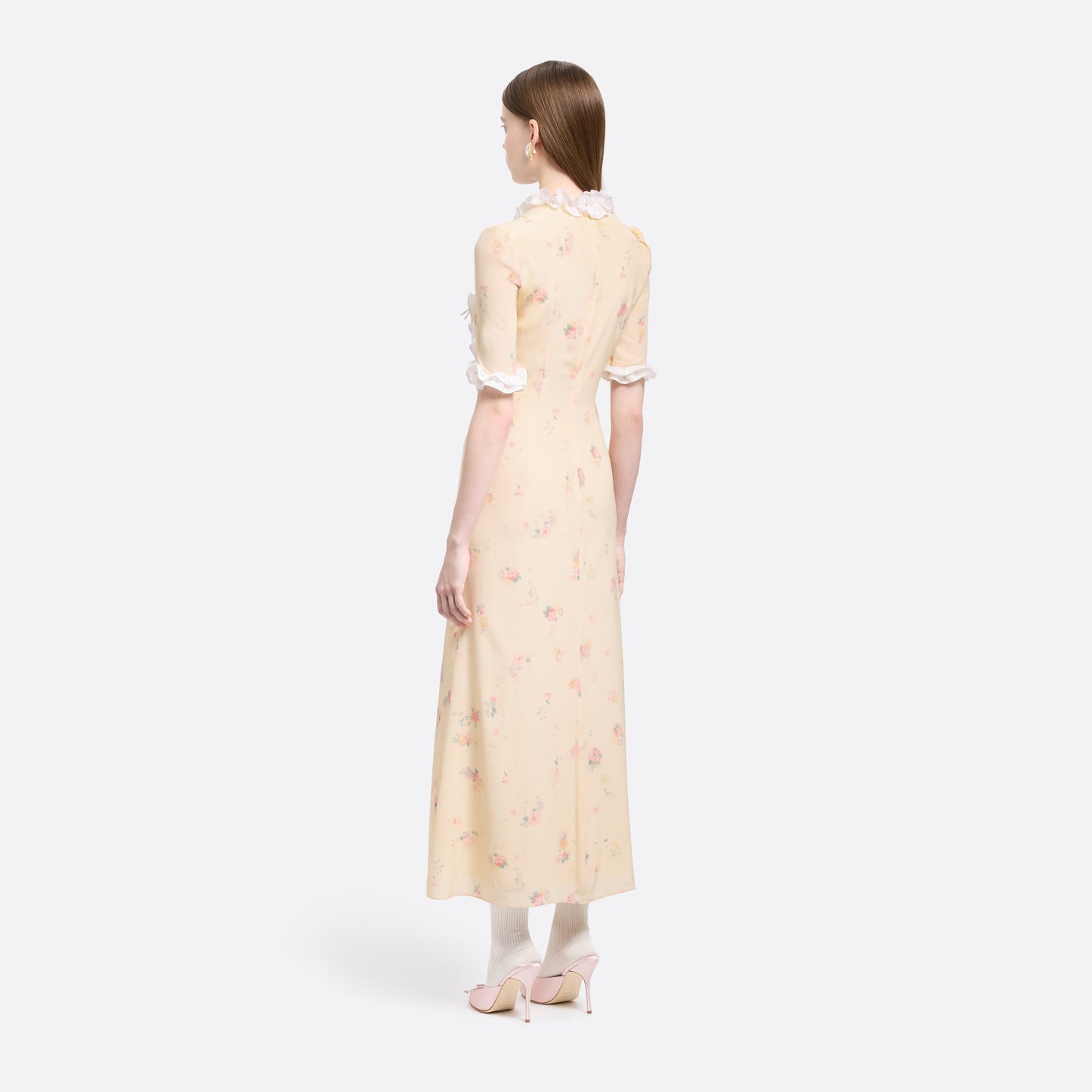 Cream floral-print silk crêpe de chine midi dress with short sleeves detailed with a ruffled trim and an asymmetric ruffle detail finished with bows.