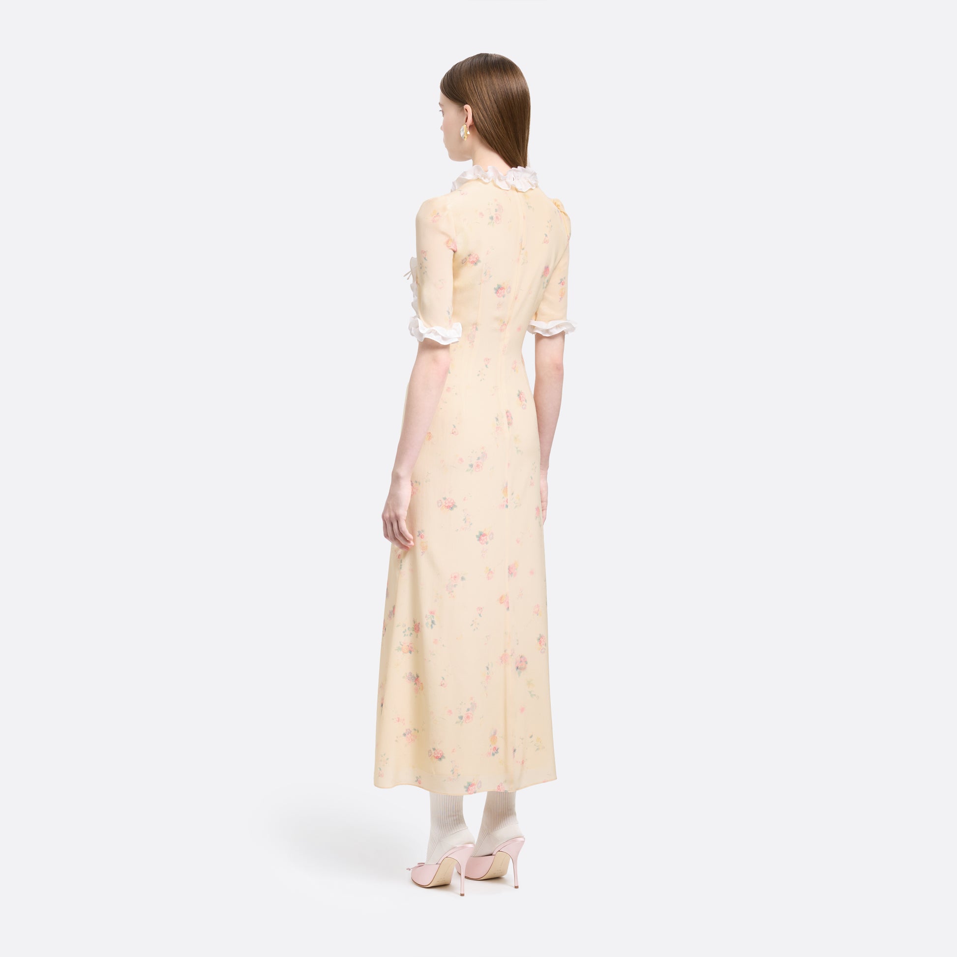 Cream floral-print silk crêpe de chine midi dress with short sleeves detailed with a ruffled trim and an asymmetric ruffle detail finished with bows.