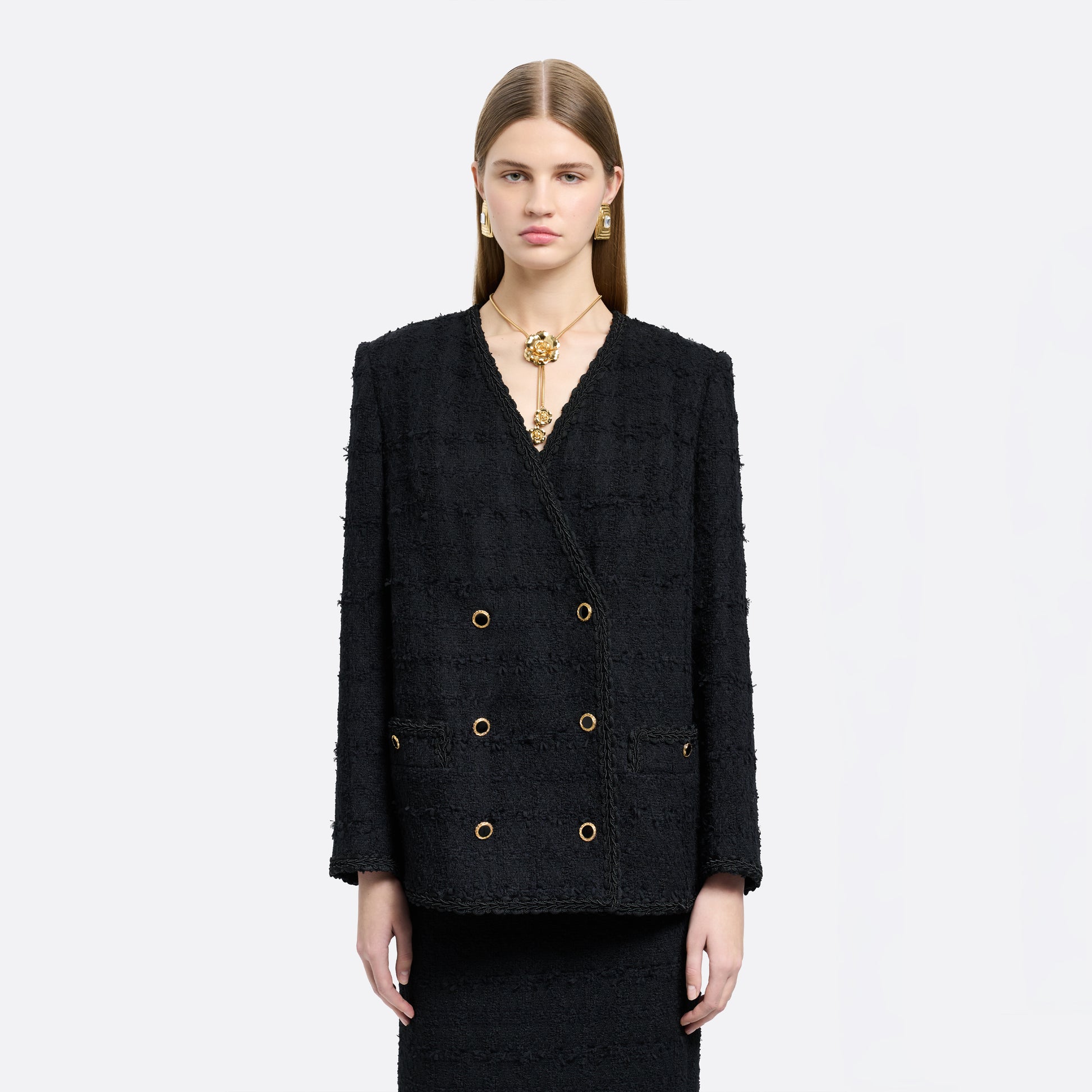 Black check tweed bouclé double-breasted jacket cut to a slightly boxy silhouette with long sleeves finished with gold-tone buttons.

Look 5 – Fall Winter 2026 Lookbook.