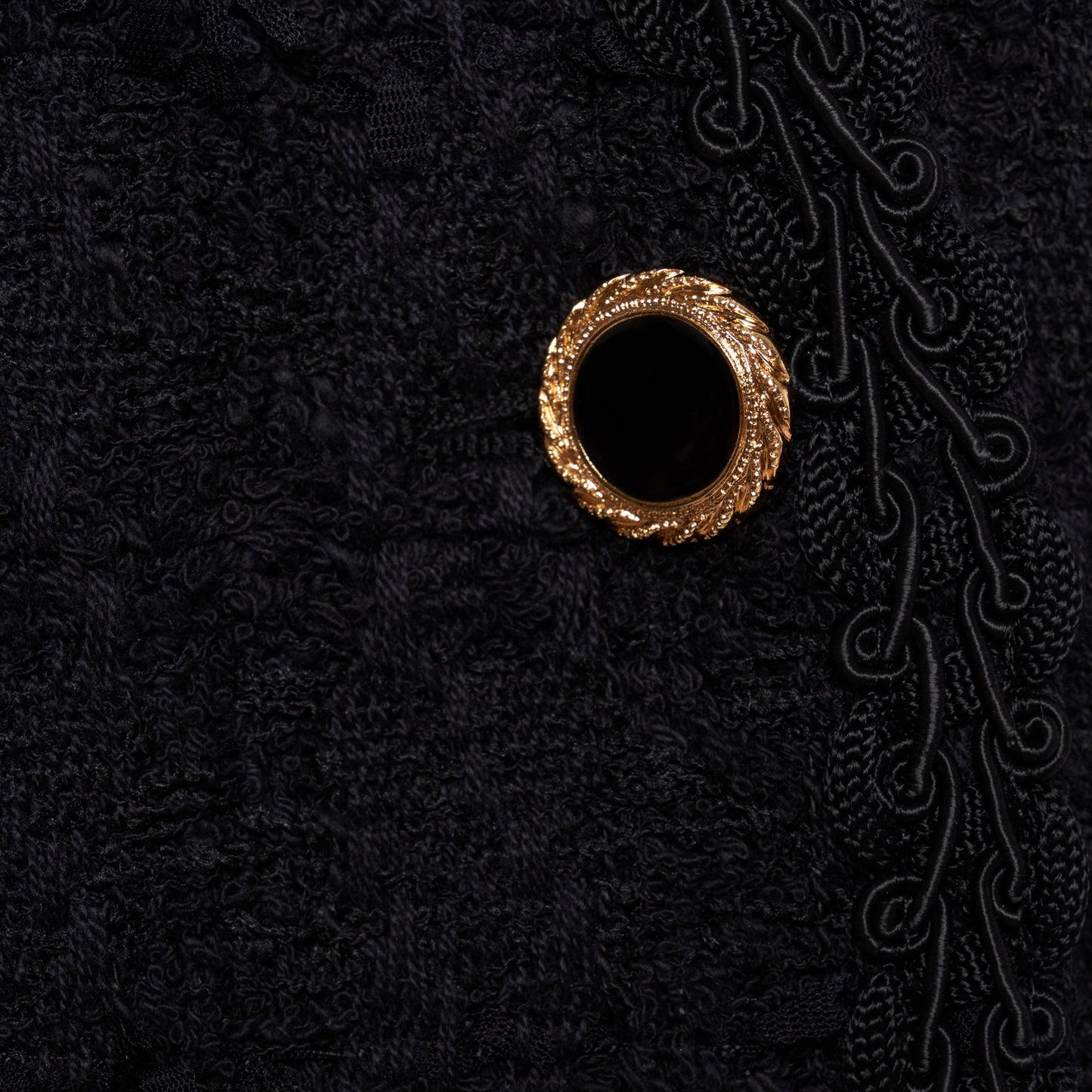 Black check tweed bouclé double-breasted jacket cut to a slightly boxy silhouette with long sleeves finished with gold-tone buttons.

Look 5 – Fall Winter 2026 Lookbook.