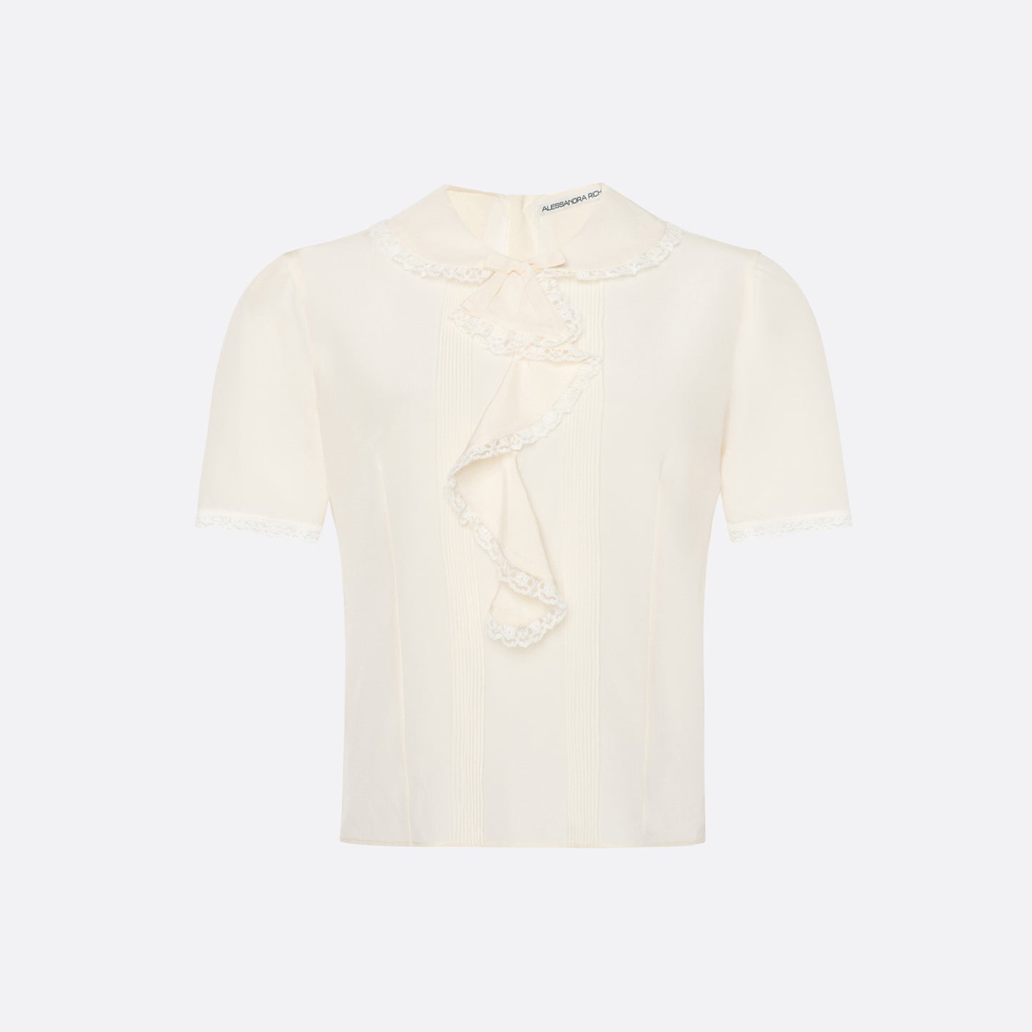 Cream silk crêpe de chine blouse with small collar, jabot and short sleeves all trimmed in lace and a back button closure.