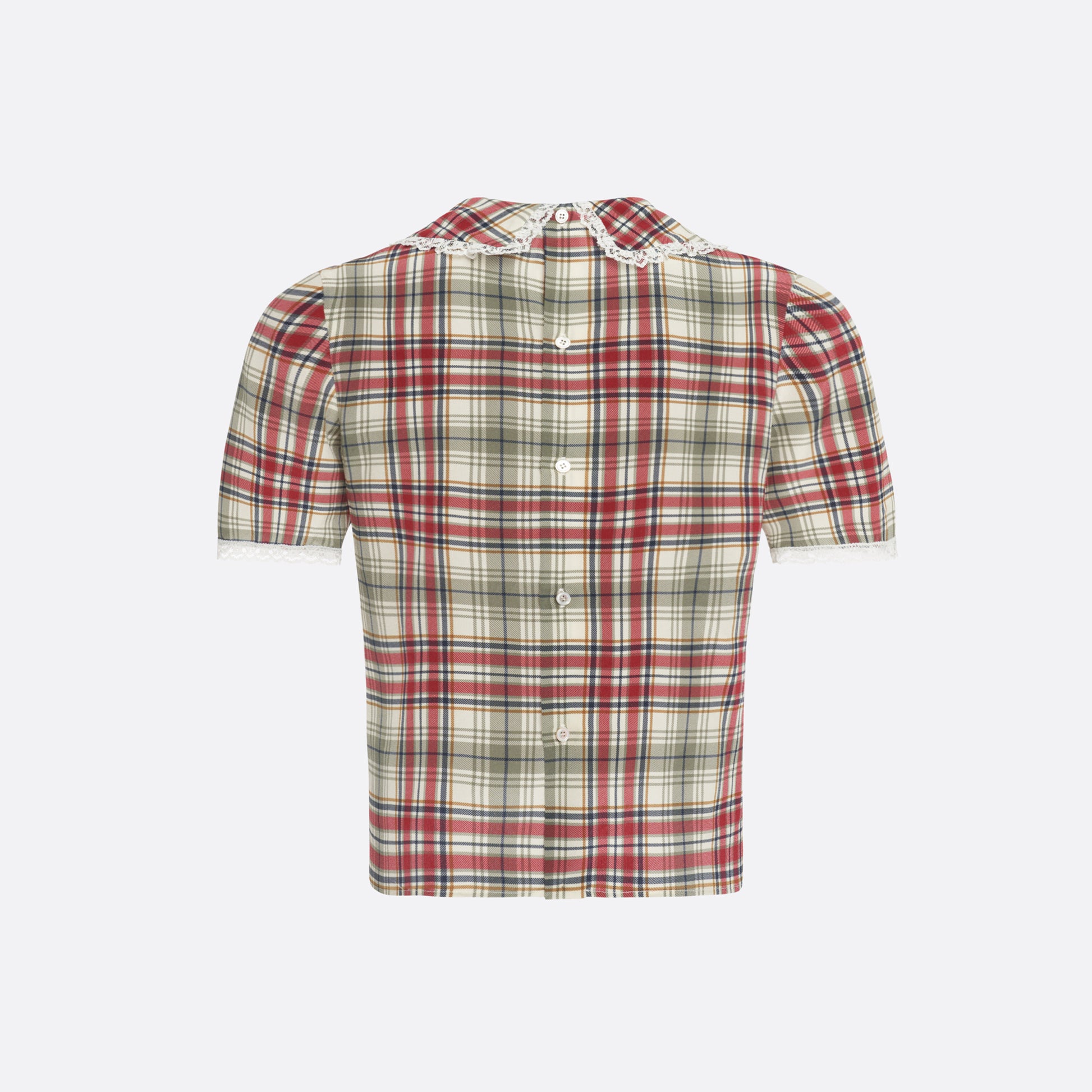 Red and green tartan-print  silk crêpe de chine blouse with small collar, jabot and short sleeves all trimmed in white lace. The blouse is fastened with a back button closure.

Look 32 – Fall Winter 2026 Lookbook.