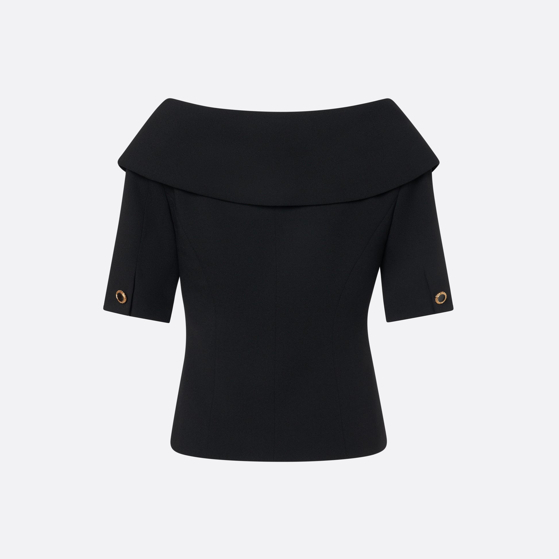 Black wool crêpe off-shoulder jacket with a wide folded neckline and short sleeves. Finished with black and gold-tone buttons and welt pockets.