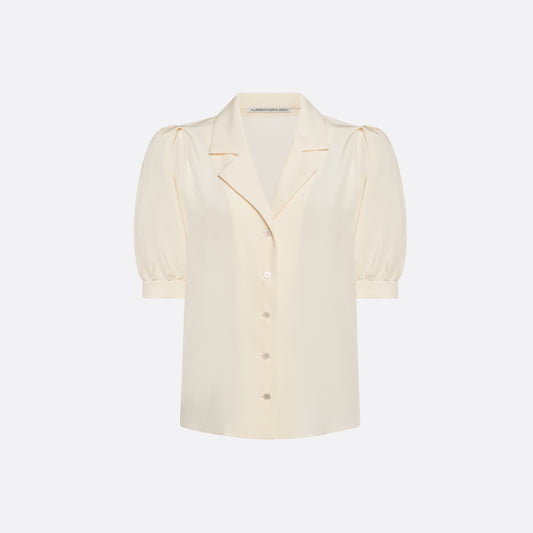 Cream silk crêpe de chine blouse with a short puff sleeves and a front button closure.