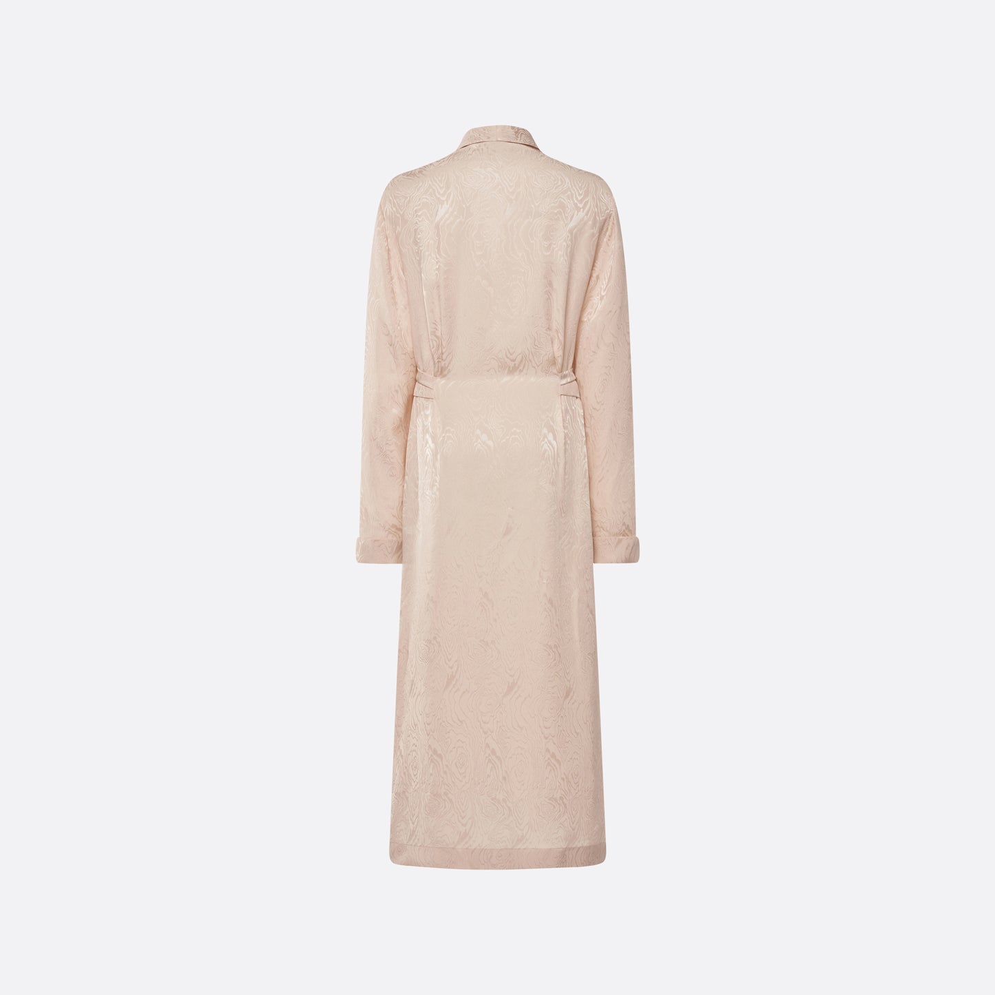 Blush silk moiré robe cut to a fluid silhouette with a shawl collar and long sleeves. Finished with a self-tie belt at the waist.