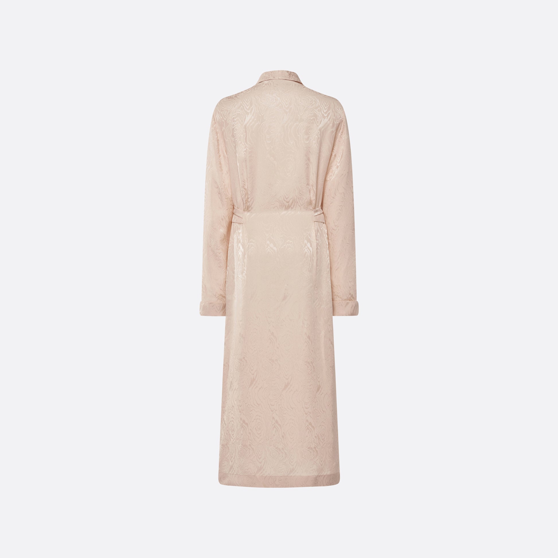 Blush silk moiré robe cut to a fluid silhouette with a shawl collar and long sleeves. Finished with a self-tie belt at the waist.