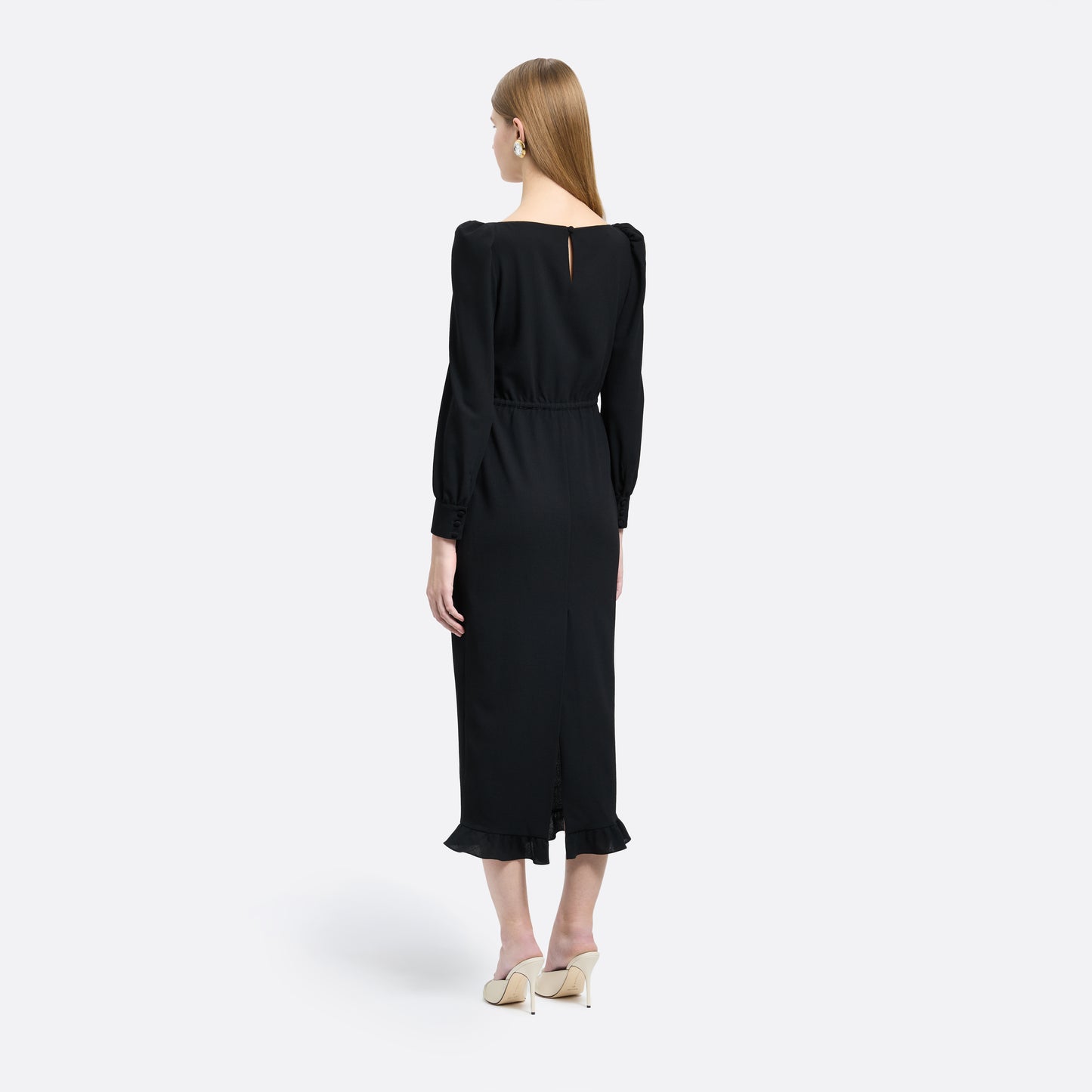 Black light wool crêpe midi dress with a scoop neckline, long sleeves and a drawstring waist. Finished with patch pockets and black and gold-tone buttons.